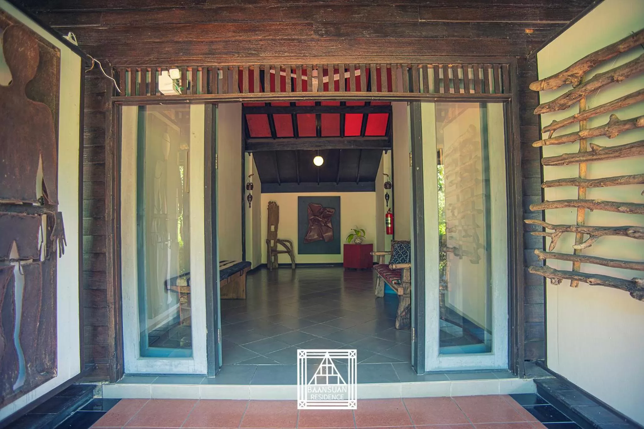 Facade/entrance in Baan Suan Residence เฮือนพักบ้านสวน