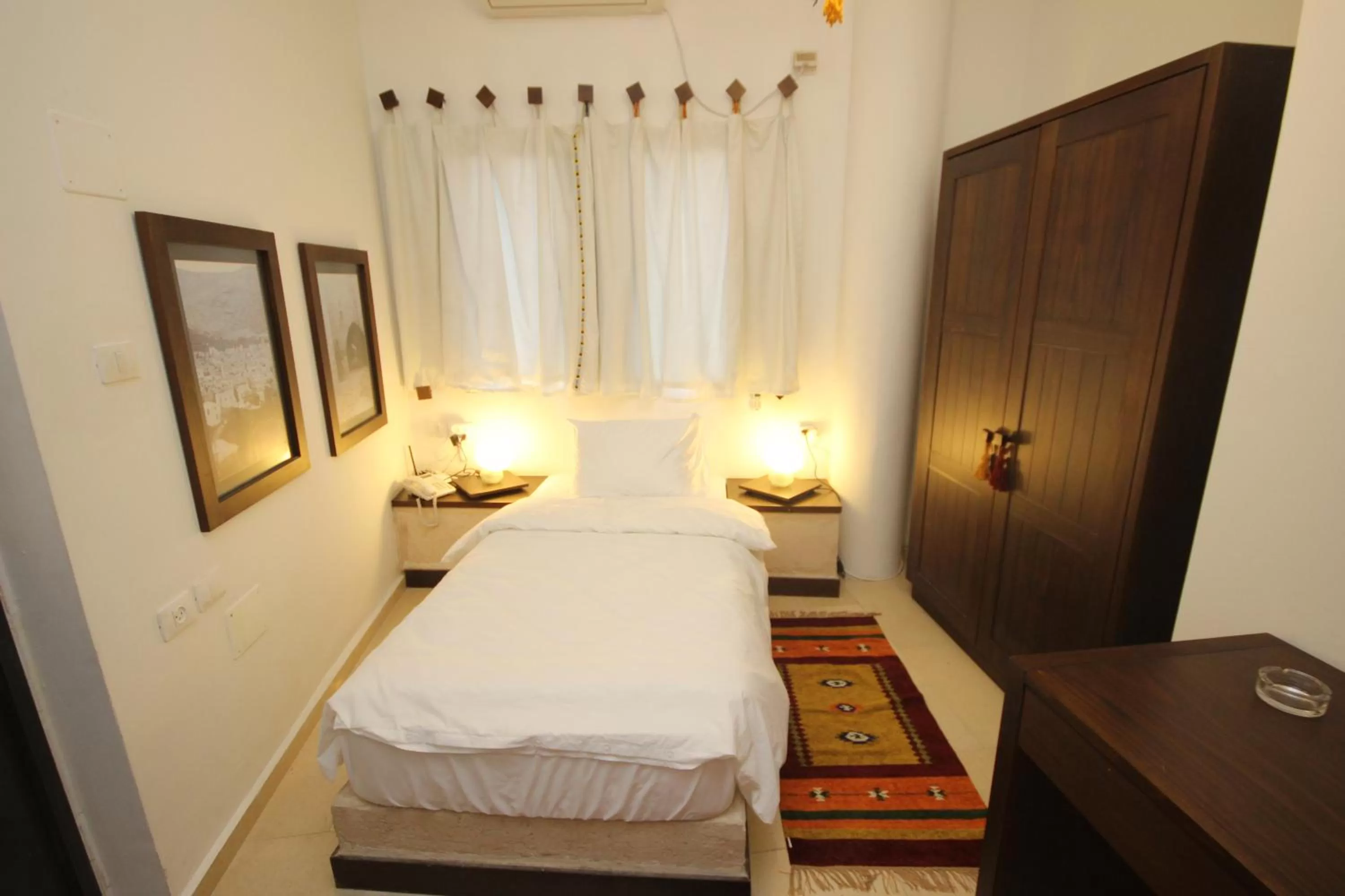 Bed in Khan Alwakala Hotel