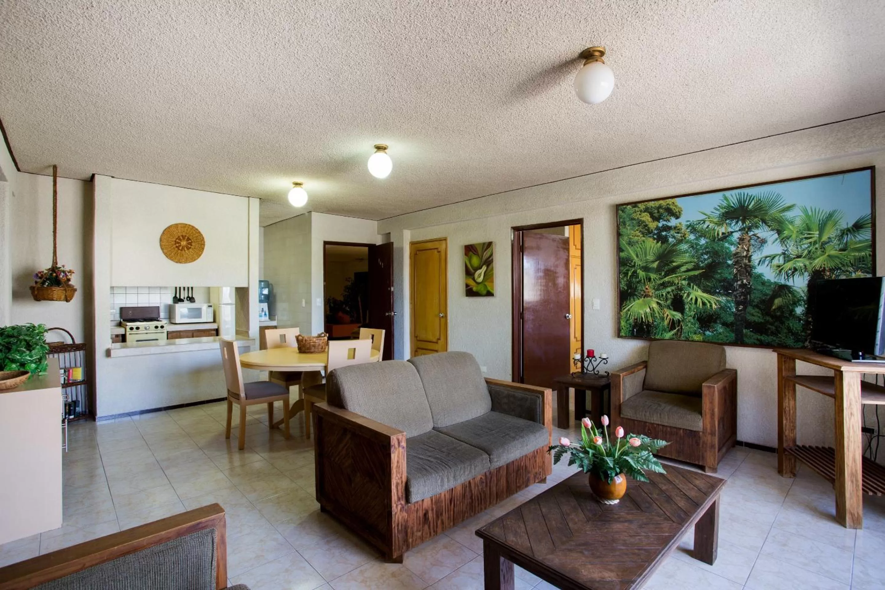 Bedroom, Seating Area in Suites Del Sol