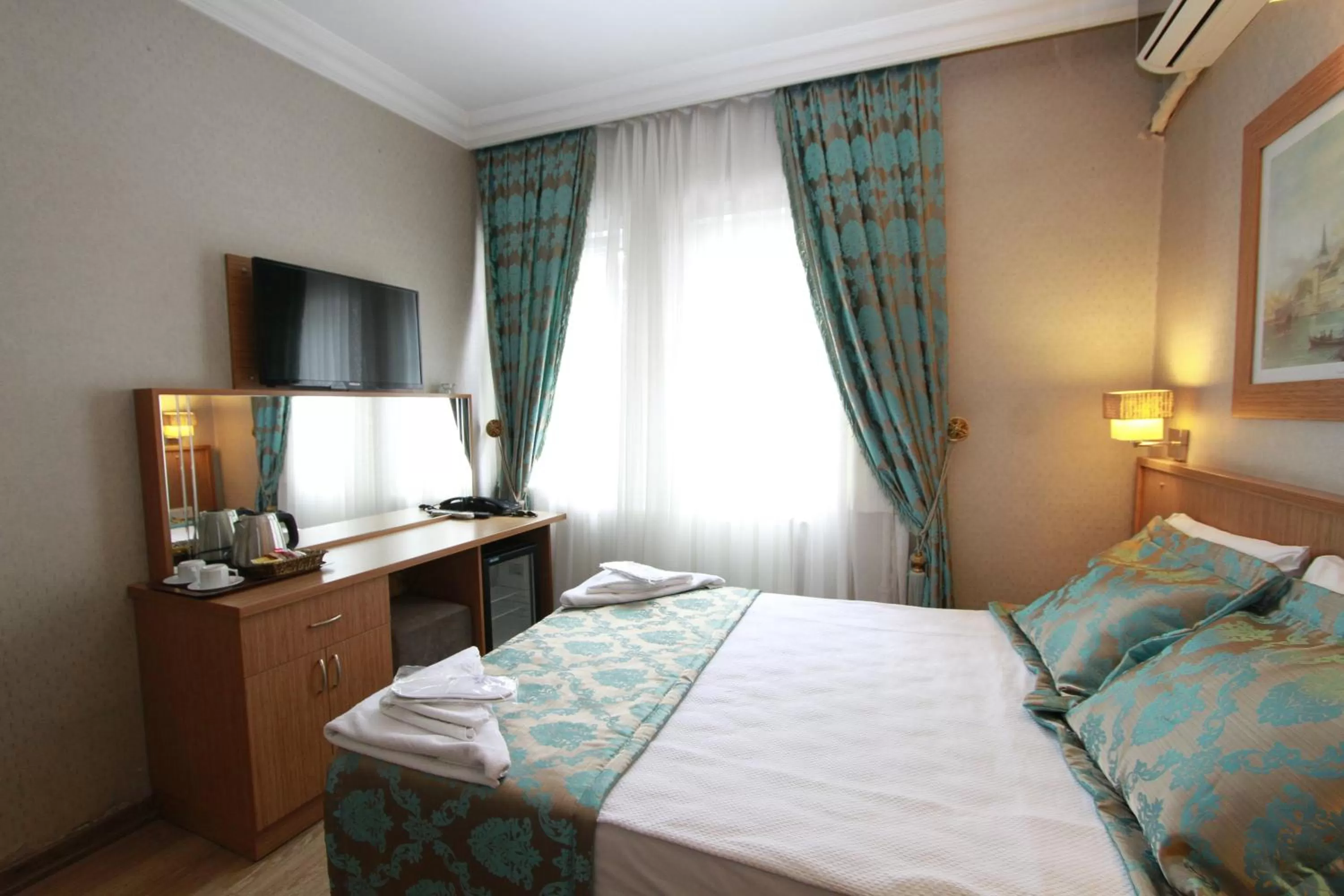 Bed in Agora Boutique Hotel & Bistro