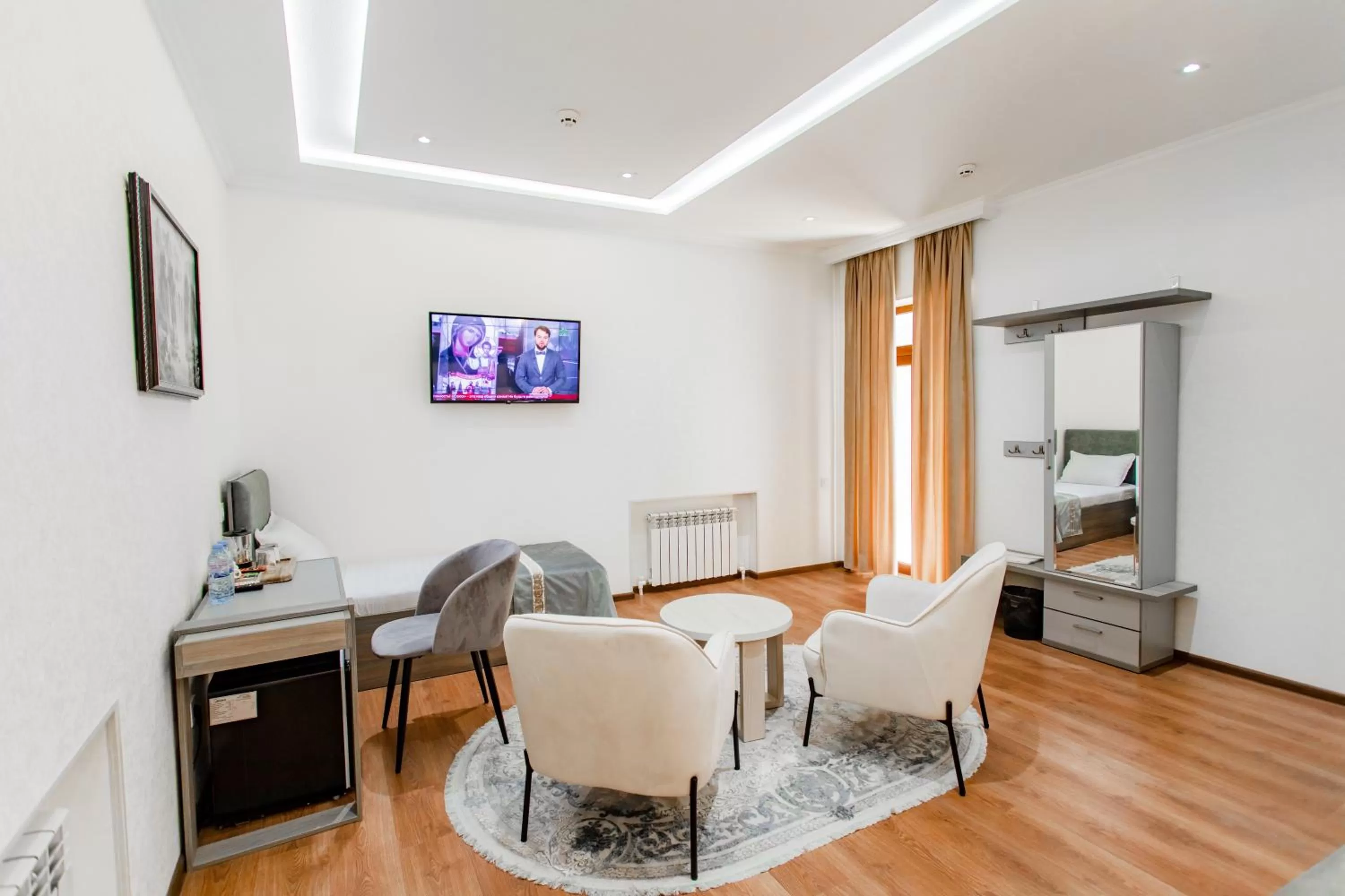 TV and multimedia, Seating Area in Registon Saroy Hotel