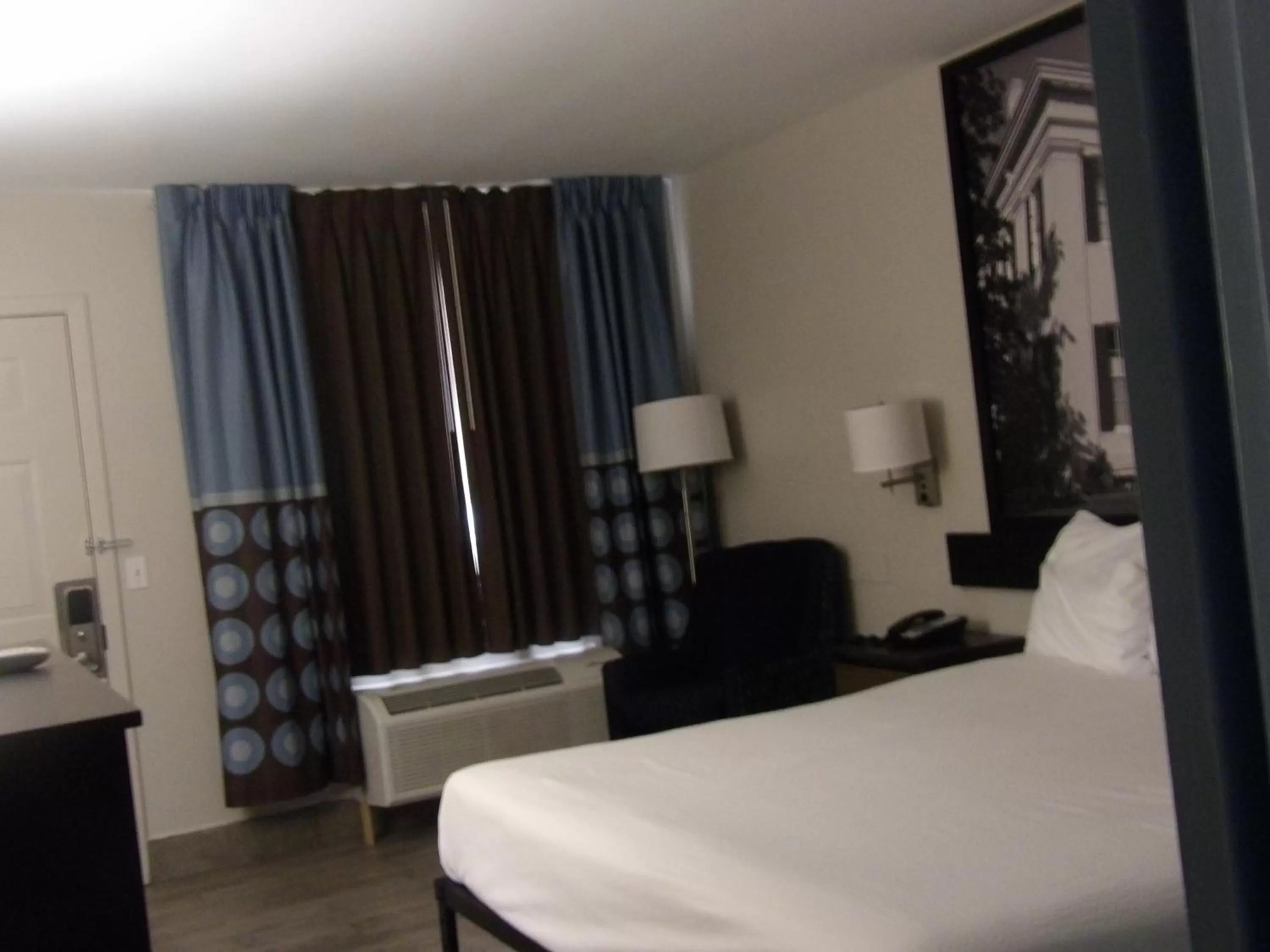 Bed in Super 8 by Wyndham Ocean Springs Biloxi