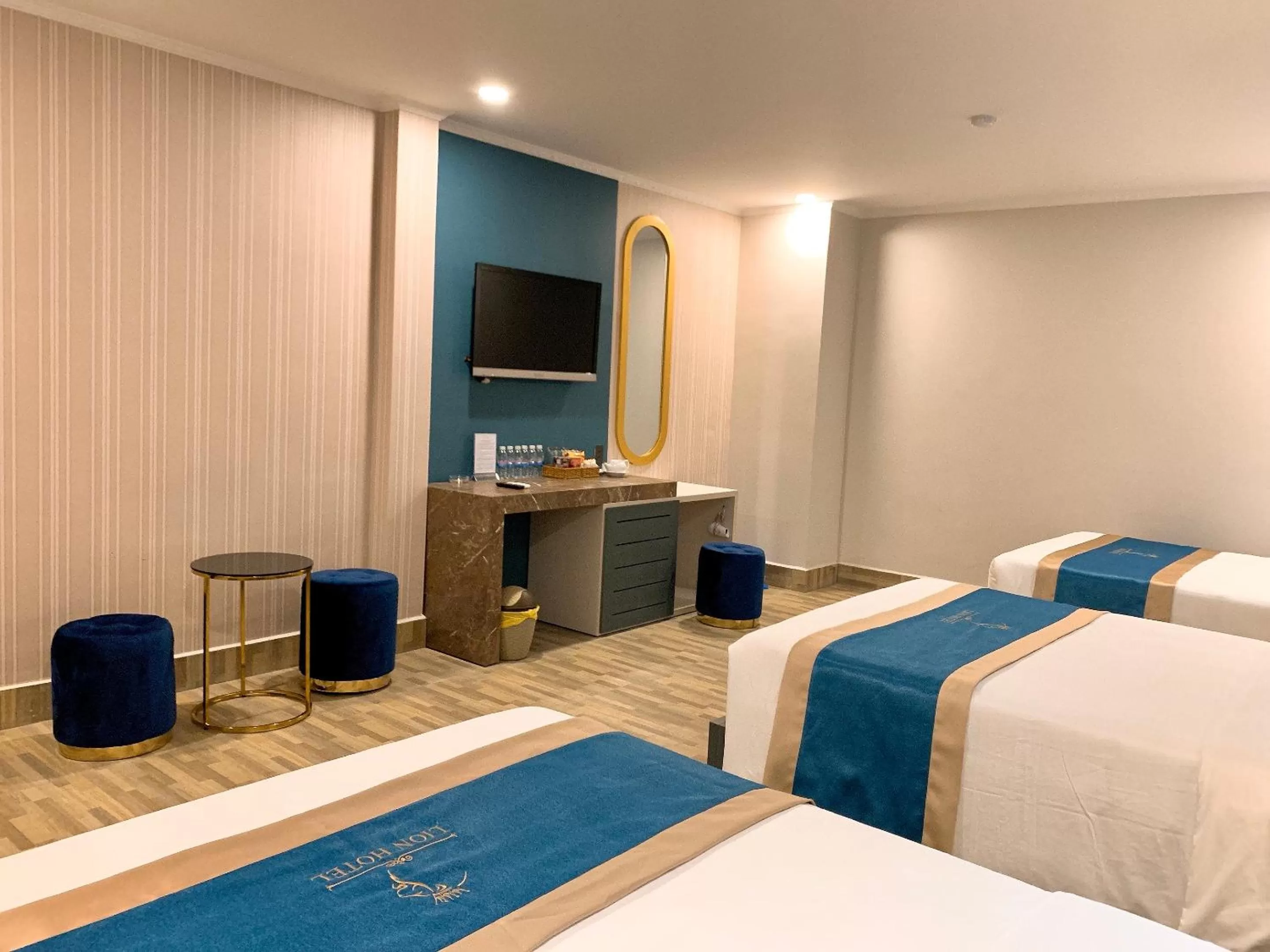 Photo of the whole room, TV/Entertainment Center in LION HOTEL