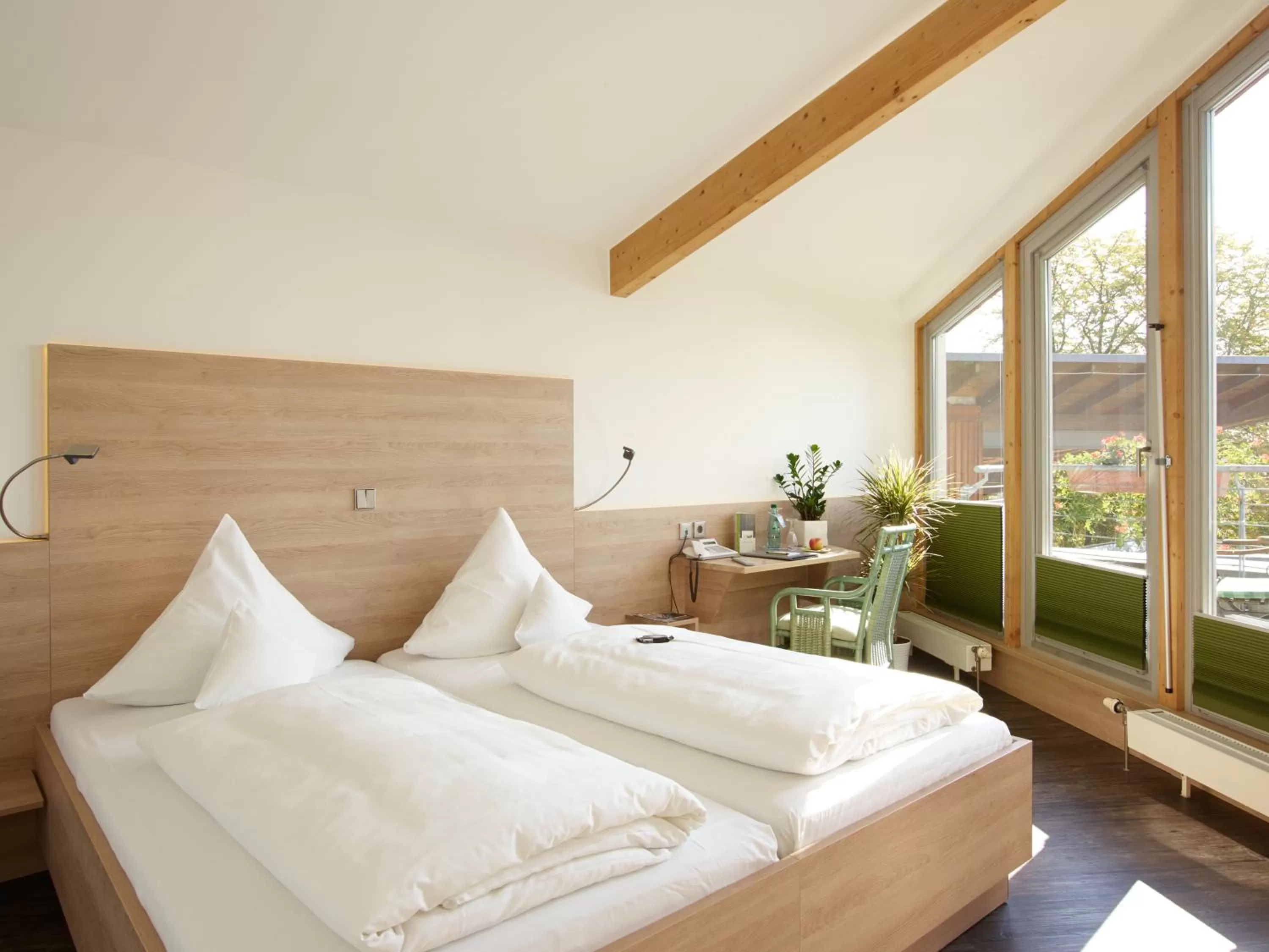 Bed in Hotel Forsthaus Grüna Betreibergesellschaft mbH