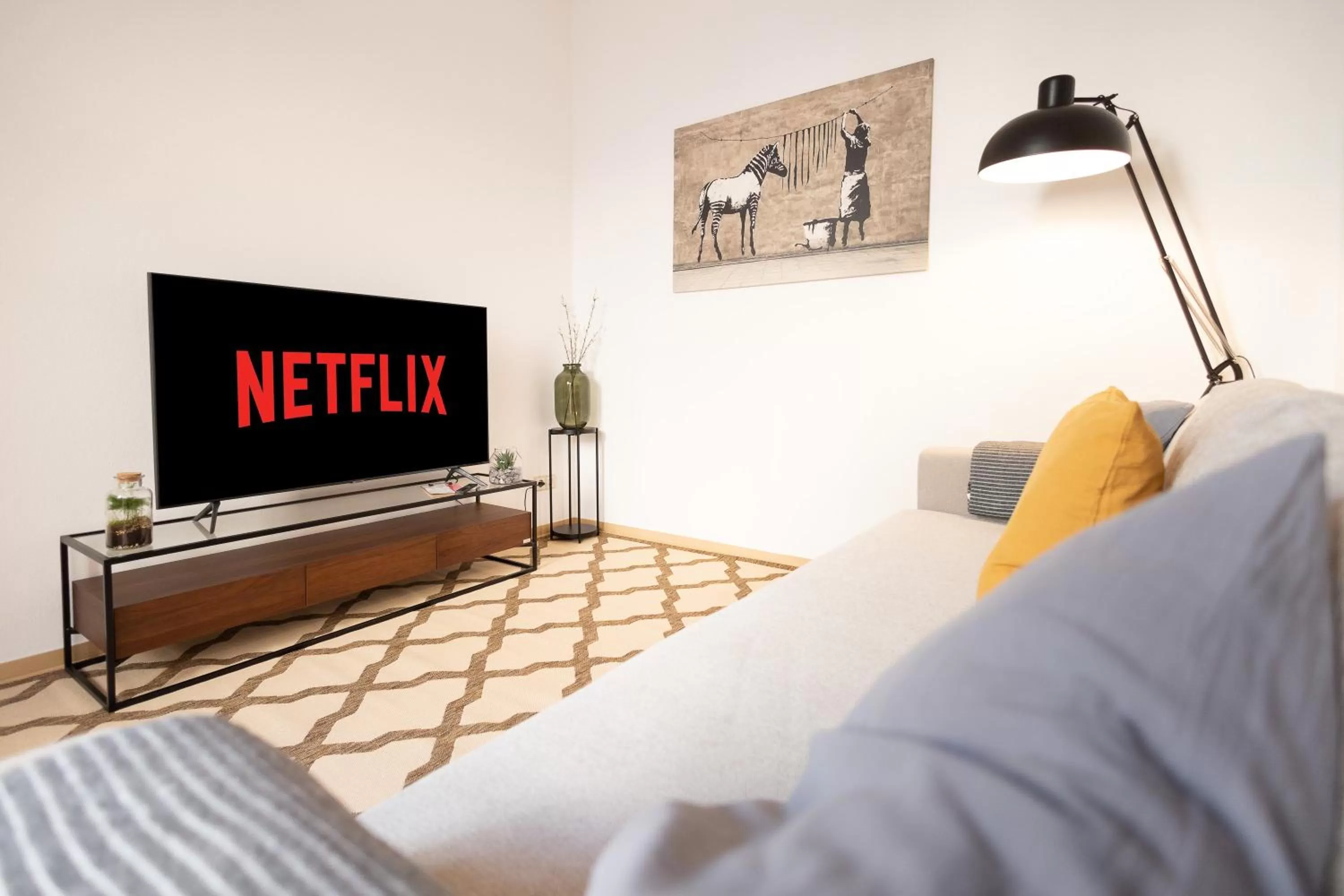 Living room, TV/Entertainment Center in Ko-Living Space an der Oper - Street Art Design Apartments