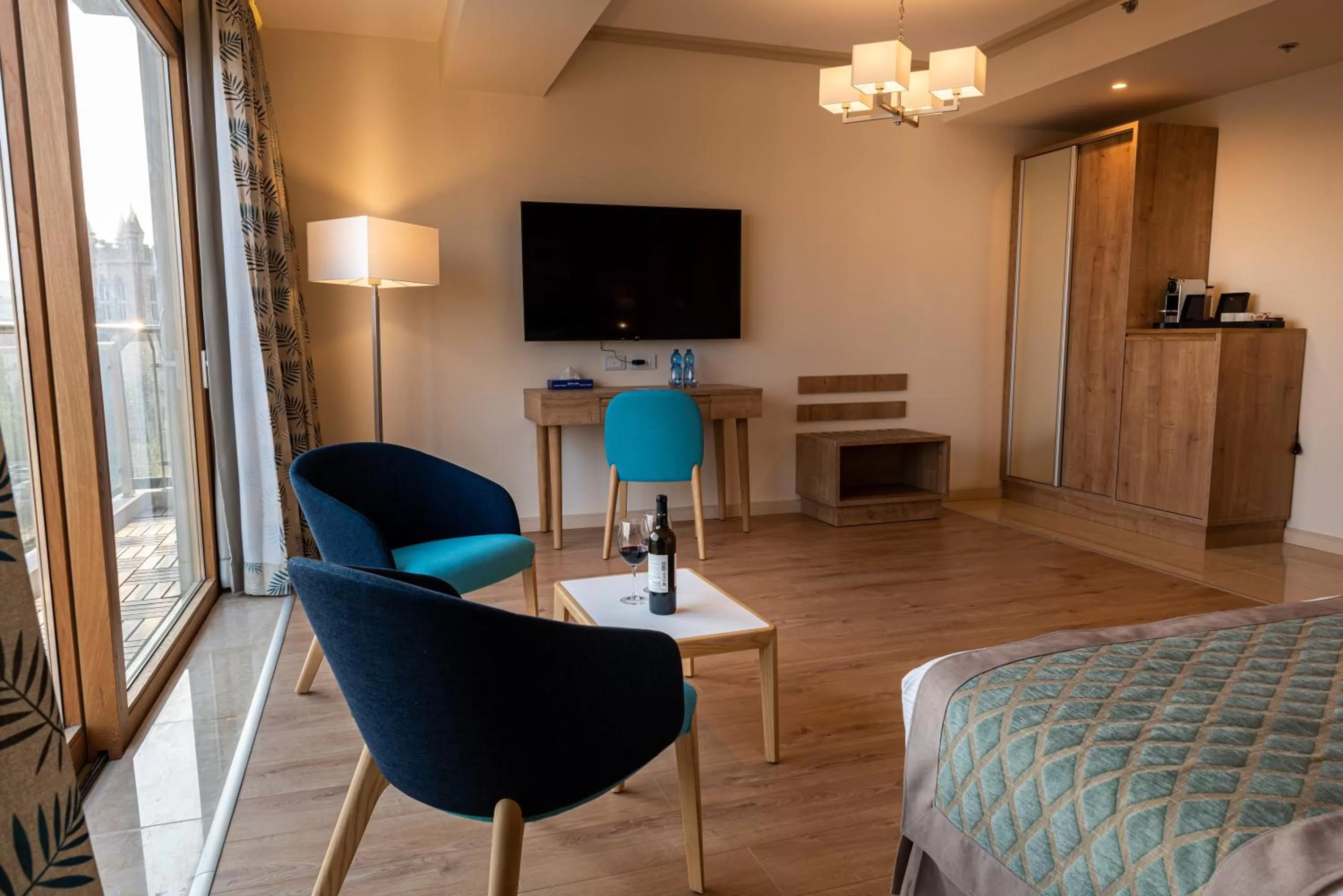 TV and multimedia, TV/Entertainment Center in Ambassador Boutique Hotel