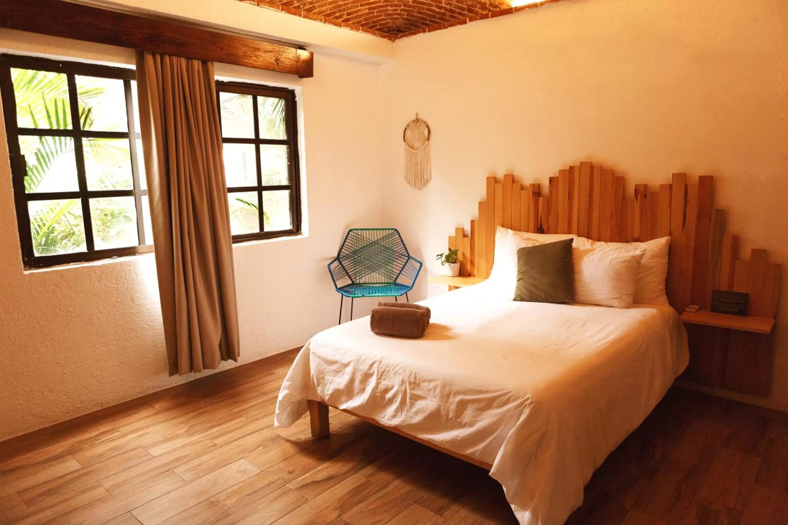 Bed in Enigmatic Hotel Experience