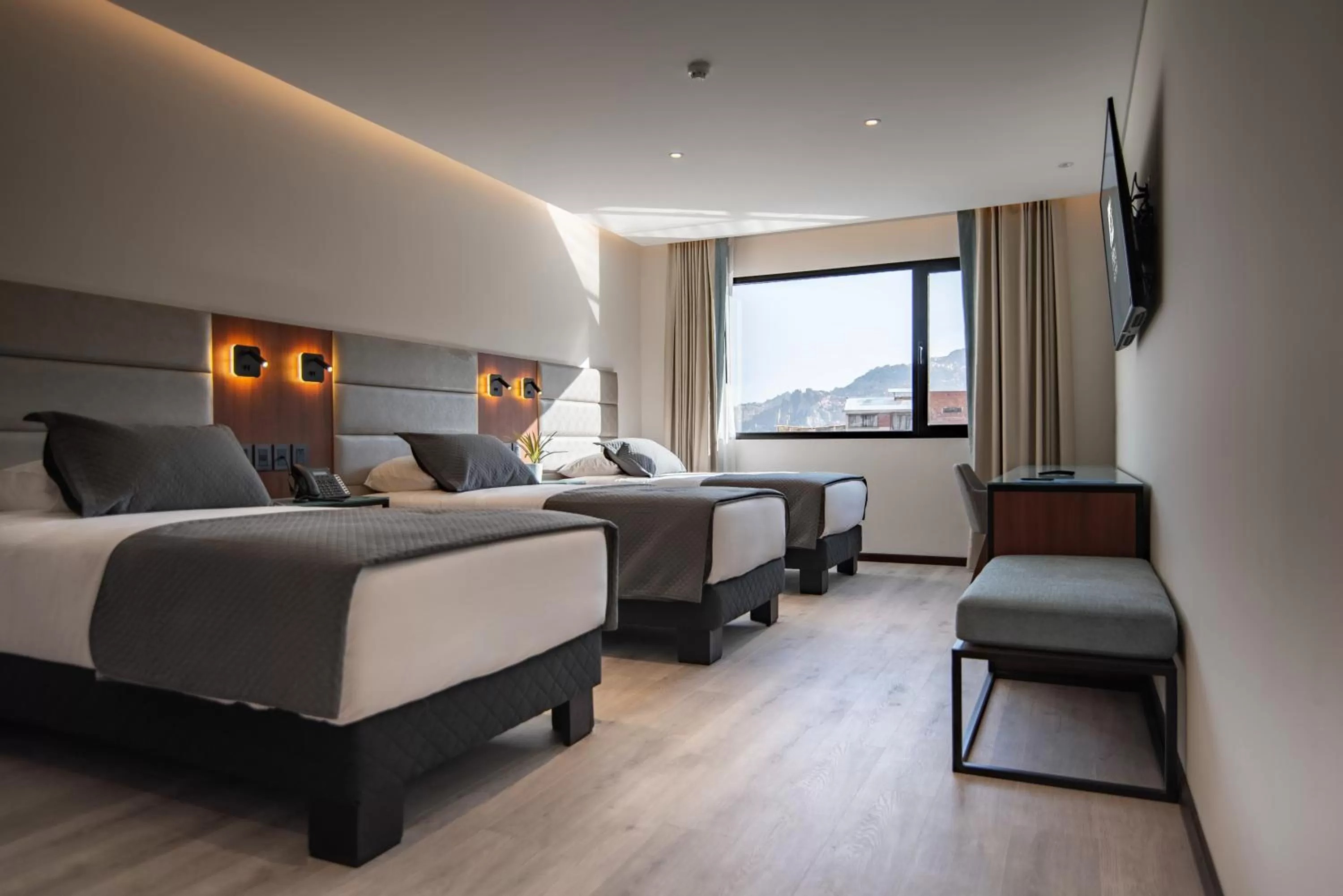 Bed in Mitru Express Hotel