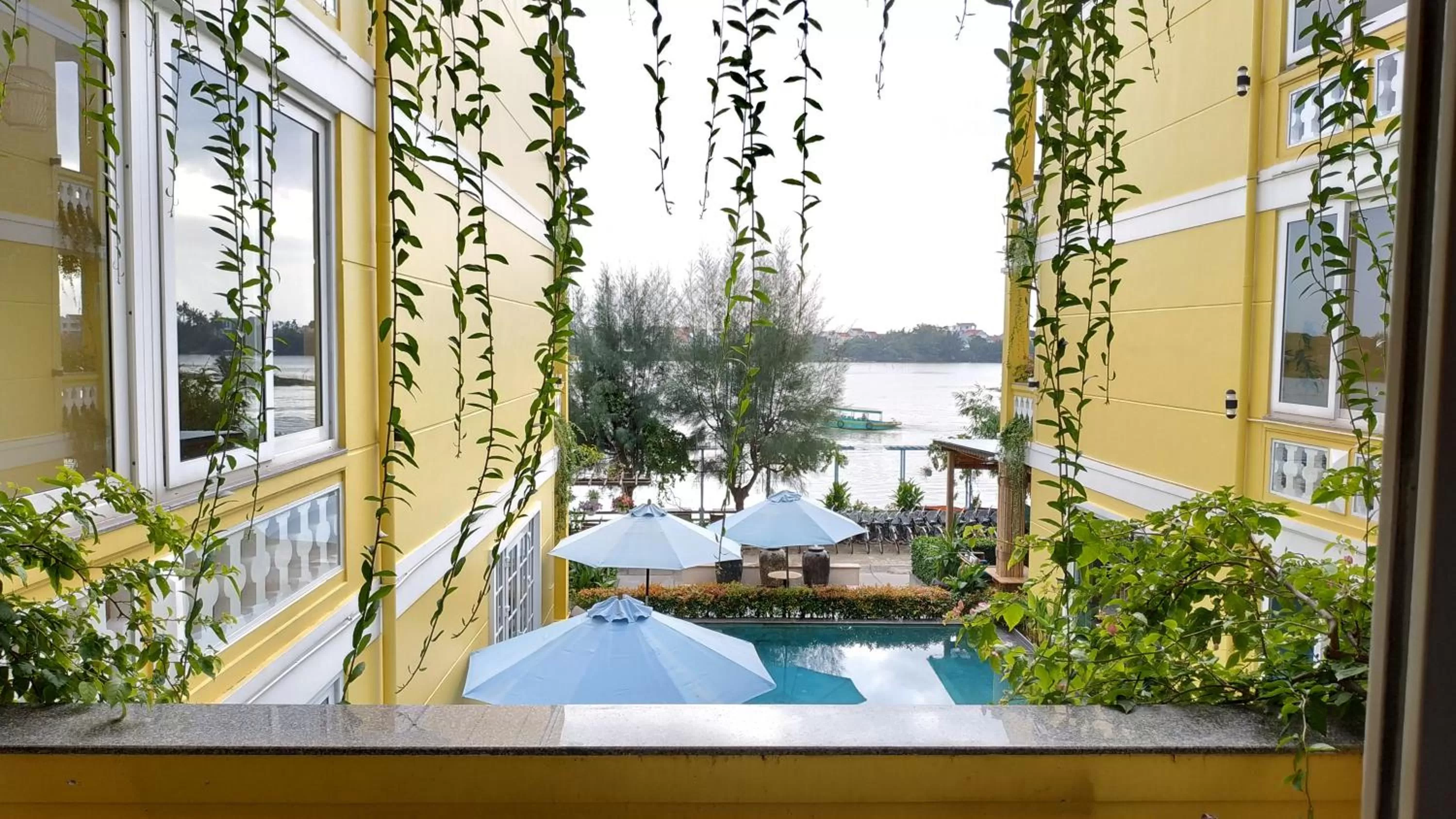 Pool View in TRIPLE Riverside Villa Hotel HoiAn