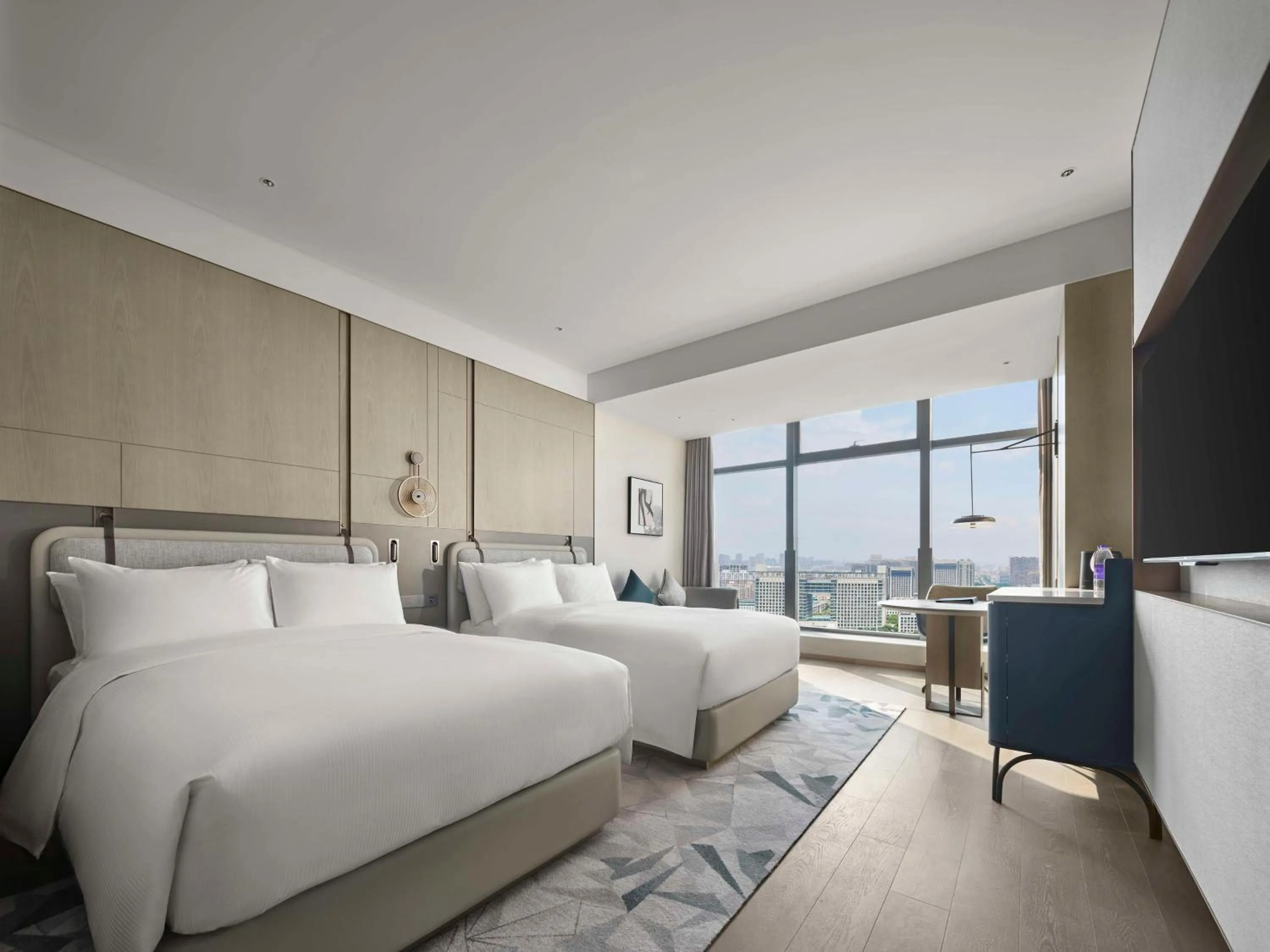 Bed in Doubletree By Hilton Rugao