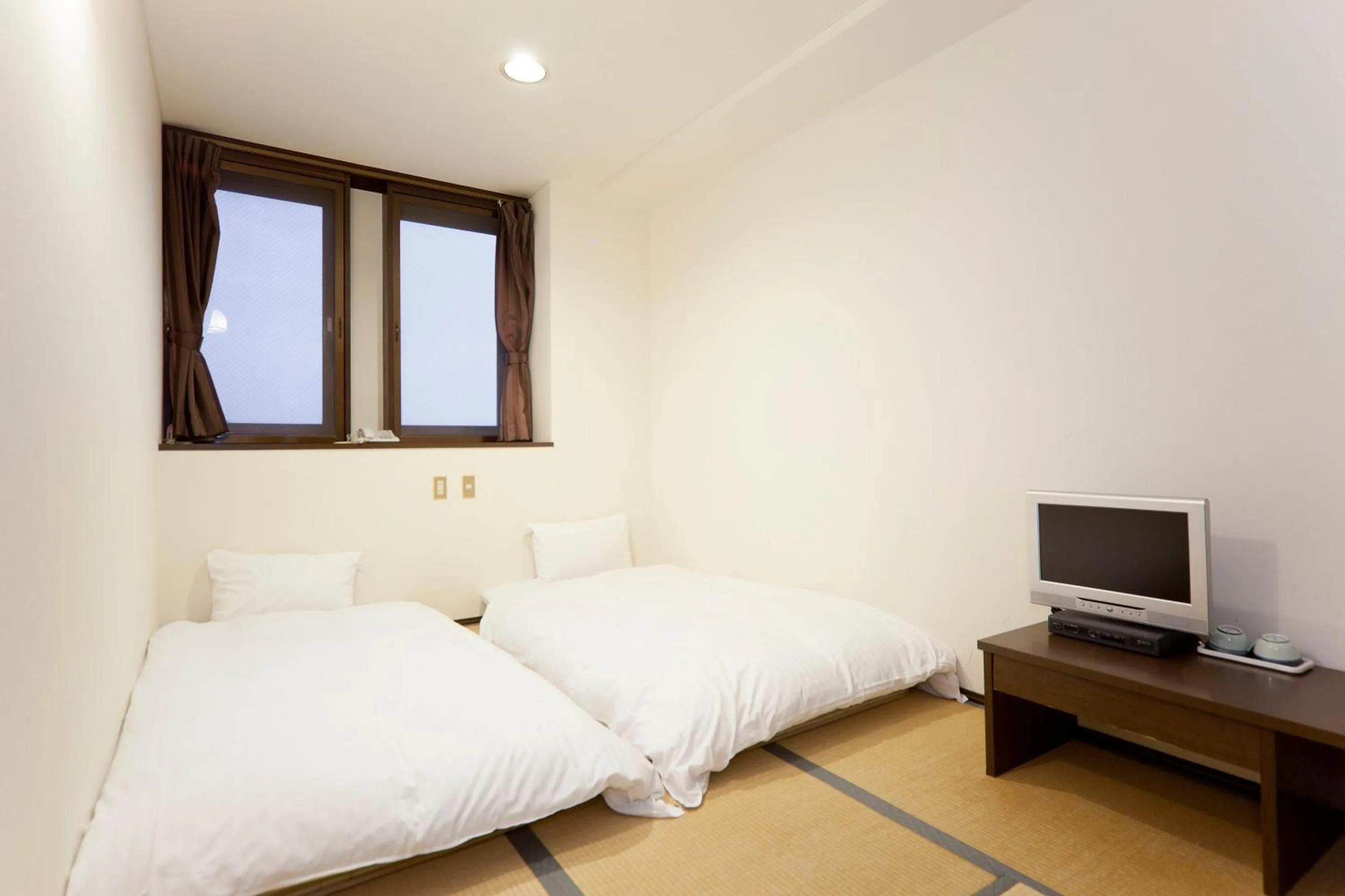 Photo of the whole room, Bed in Athena Kaigetsu