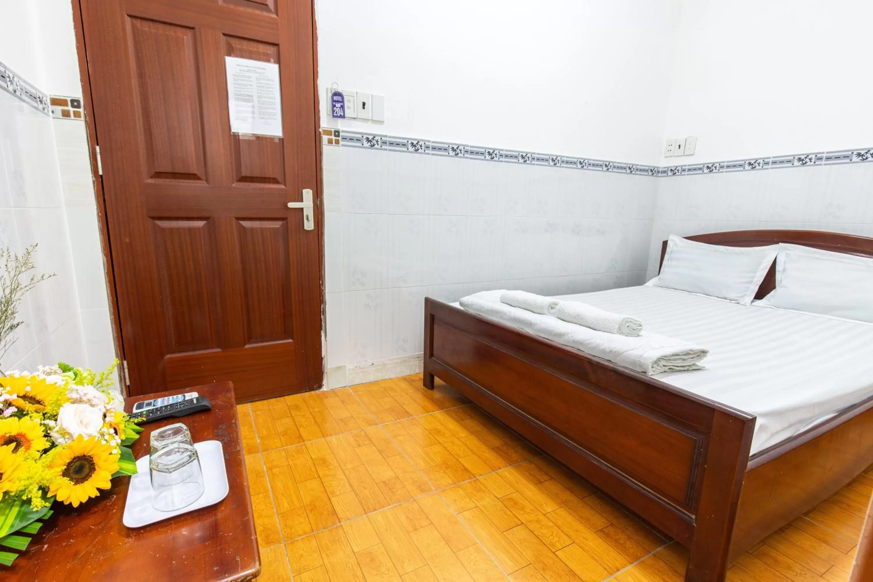 Bed in Hotel Hoa Cúc Phương Dĩ An - Bình Dương