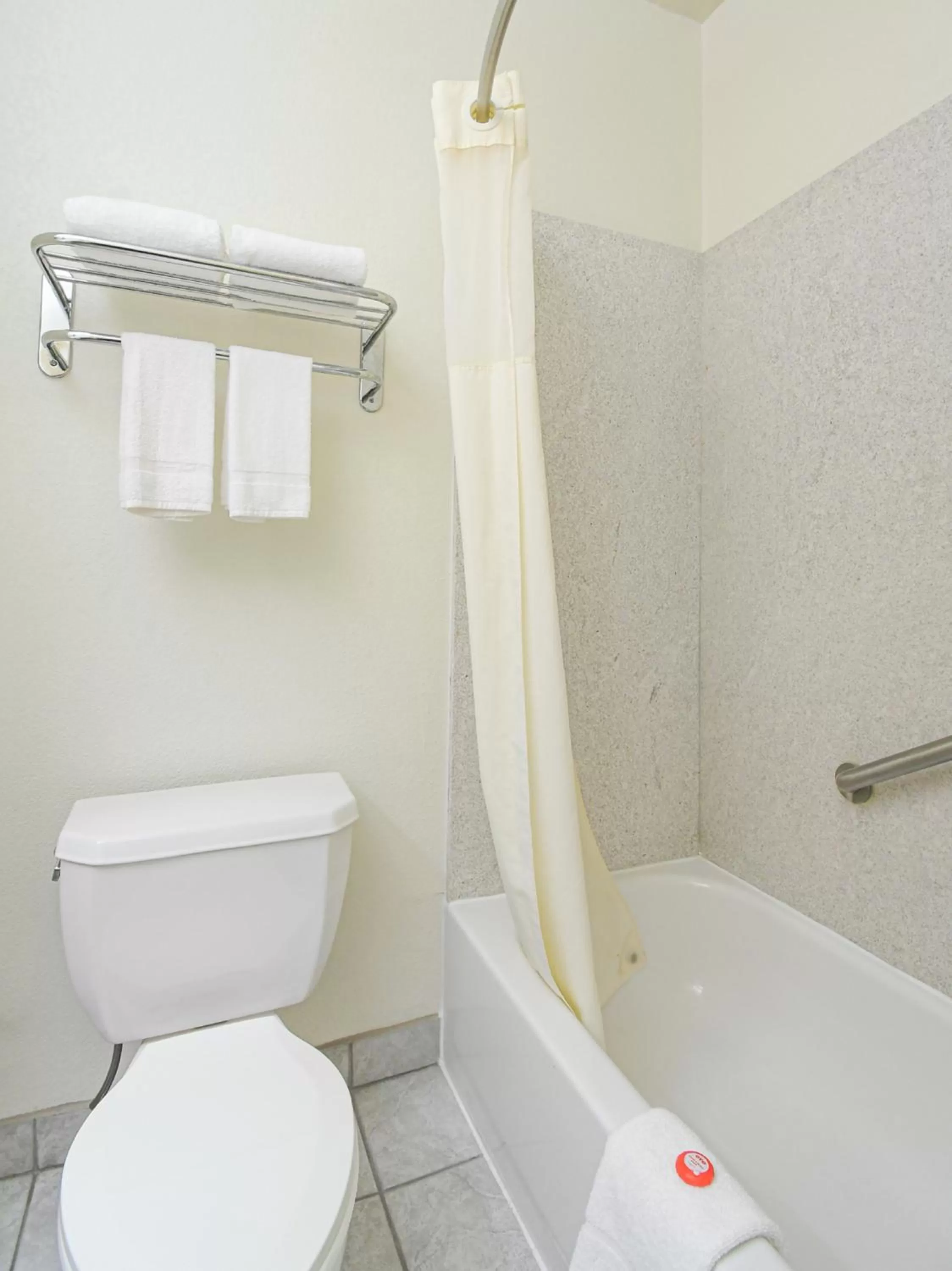 Bathroom in Baymont by Wyndham Houston Brookhollow