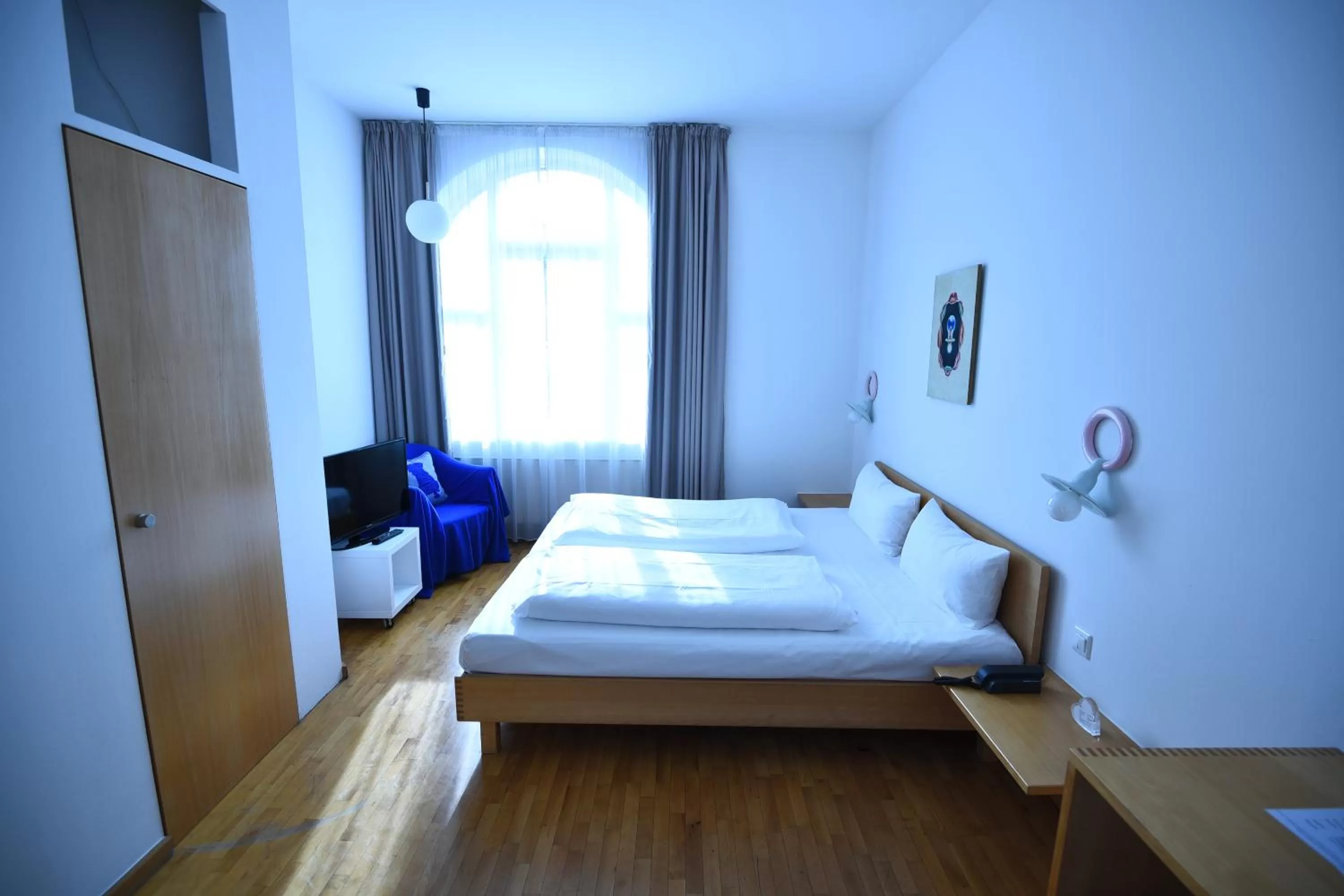 Bed in Art-Hotel Robert Mayer