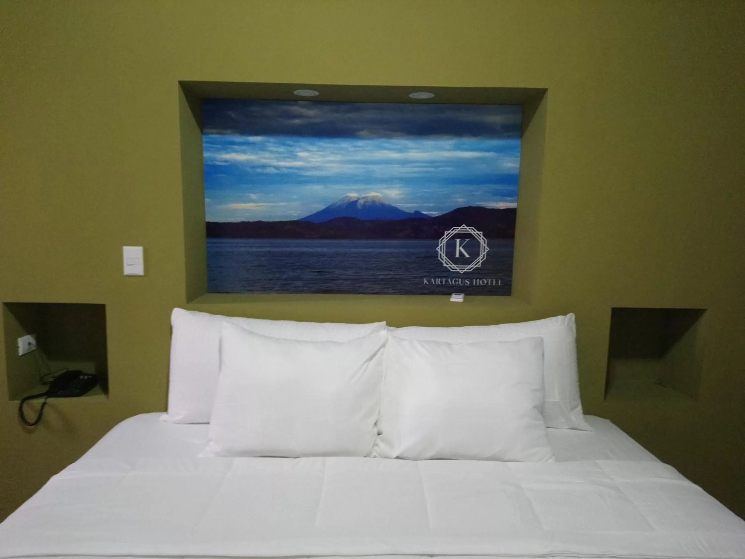 Bed in Kartagus Hotel