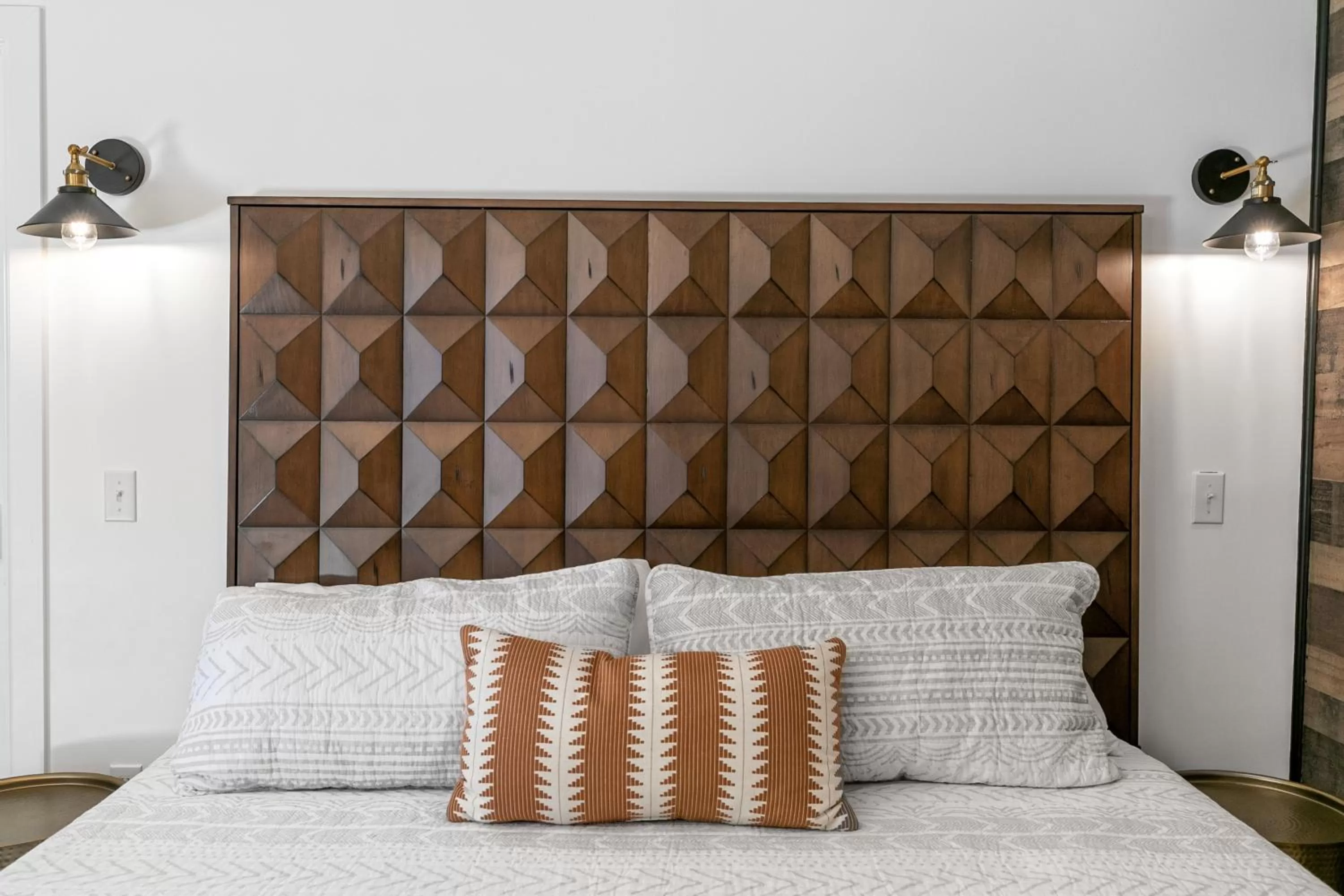 Bed in Candlewick Inn and Suites