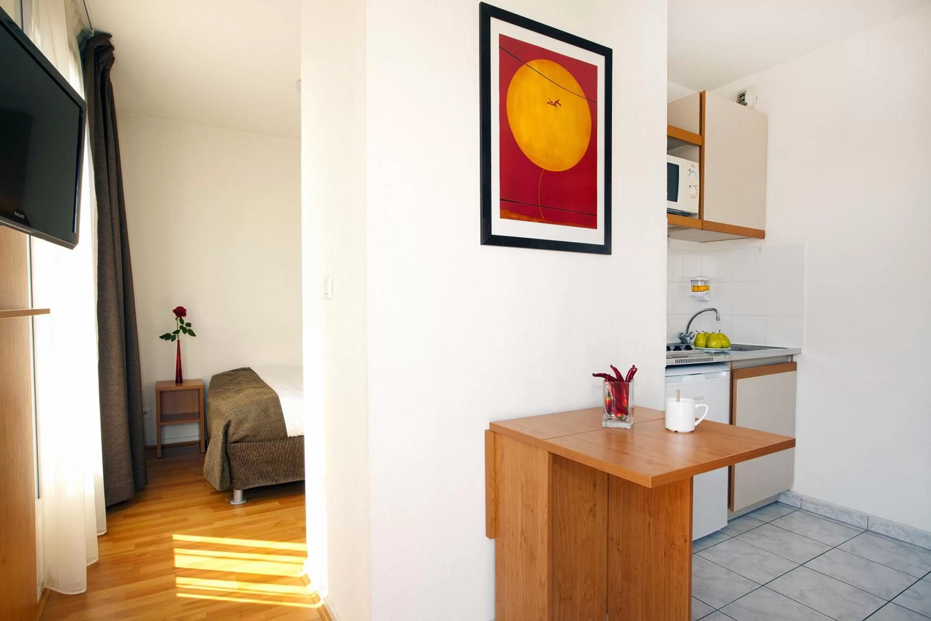 Kitchen or kitchenette in Séjours & Affaires Nantes La Beaujoire