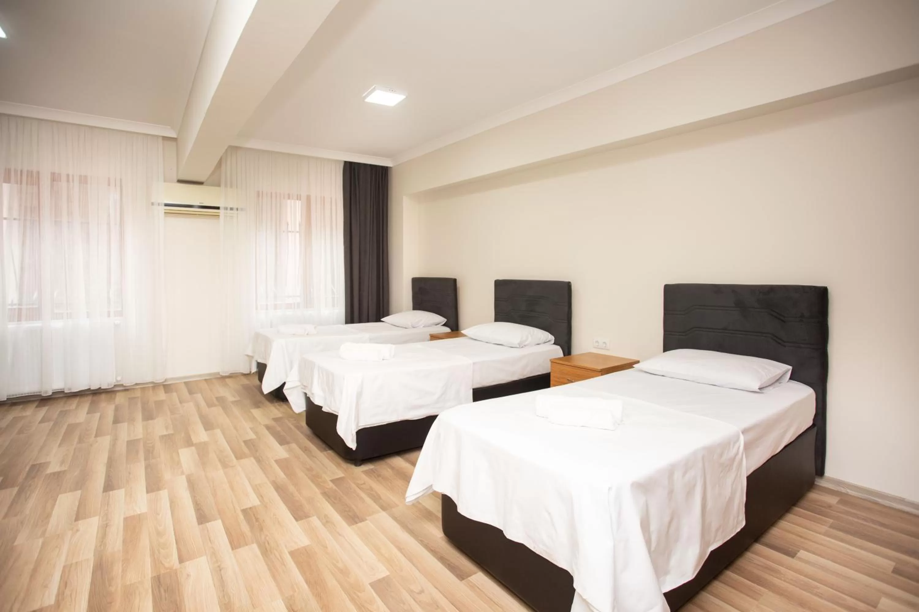 Bed in Türkler Suite Hotel