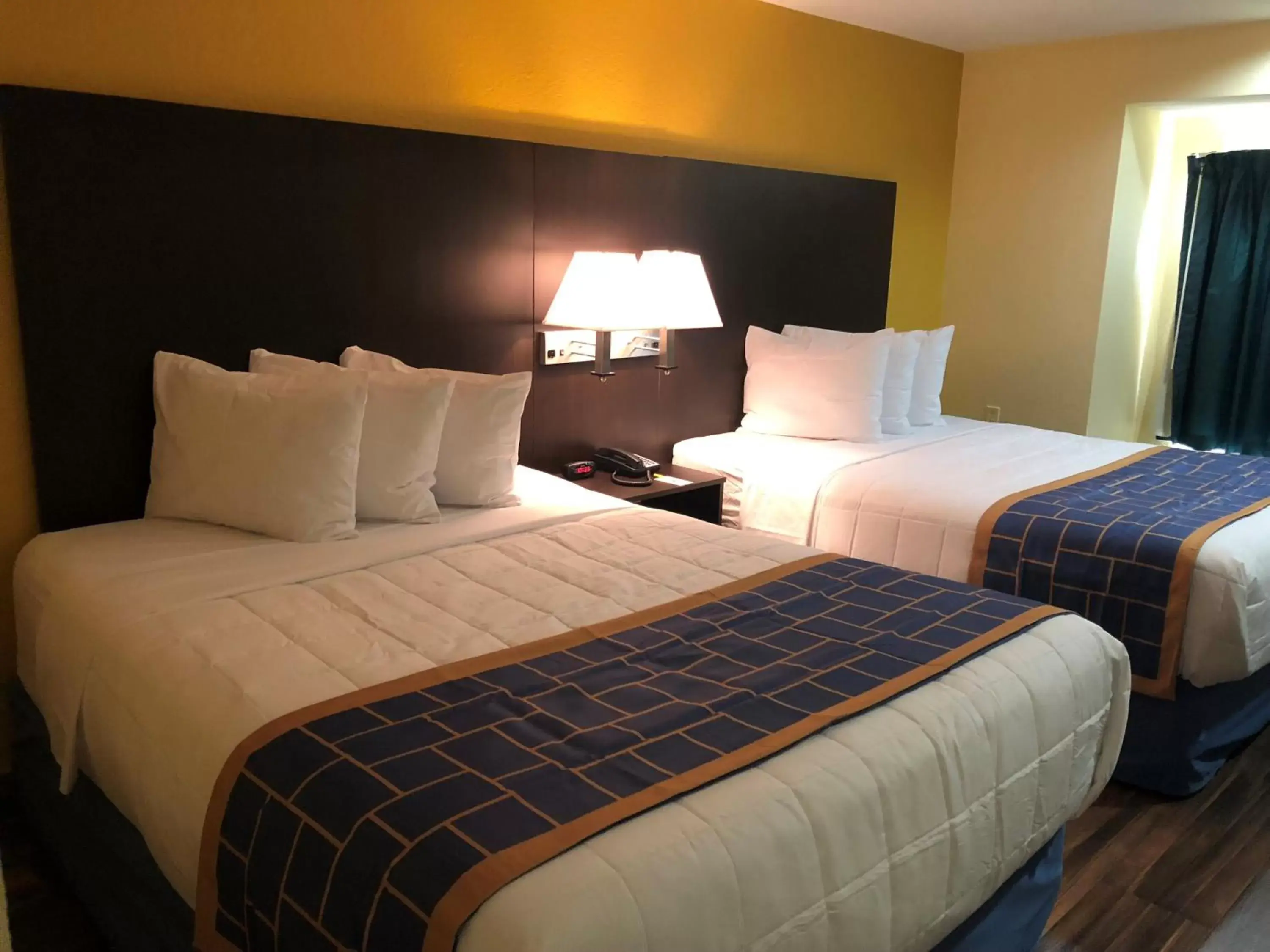Queen Room with Two Queen Beds - Non-Smoking in Days Inn & Suites by Wyndham Tampa/Raymond James Stadium Queen Room with Two Queen Beds - Non-Smoking in Days Inn & Suites by Wyndham Tampa/Raymond James Stadium