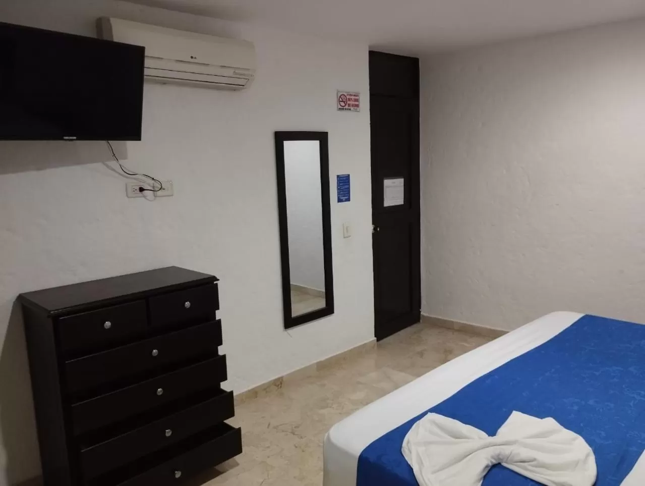 Bed in Blue Star Hotel