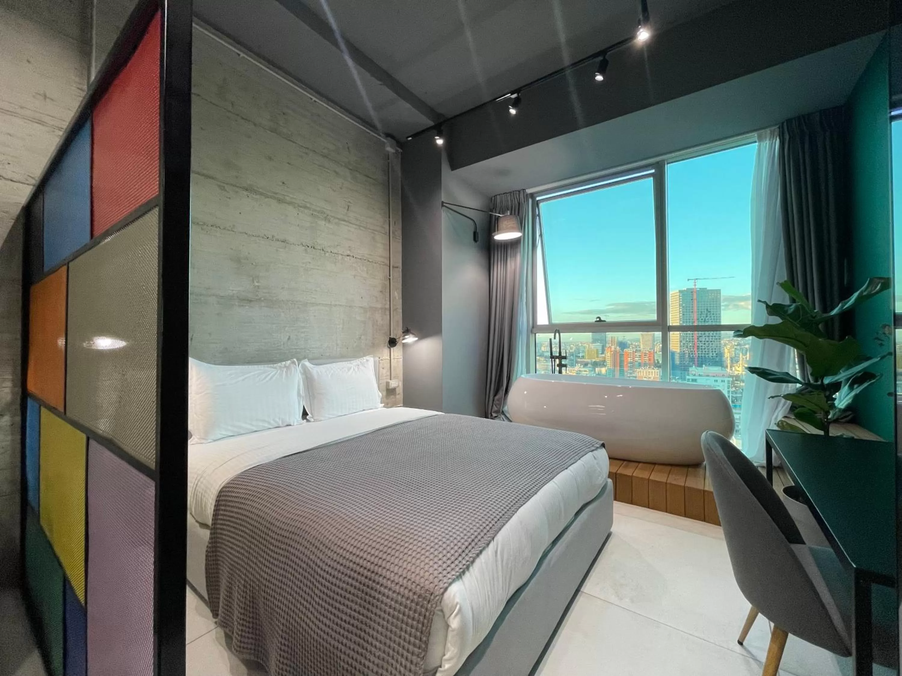 Bed in Ambassador Skyline Apartments