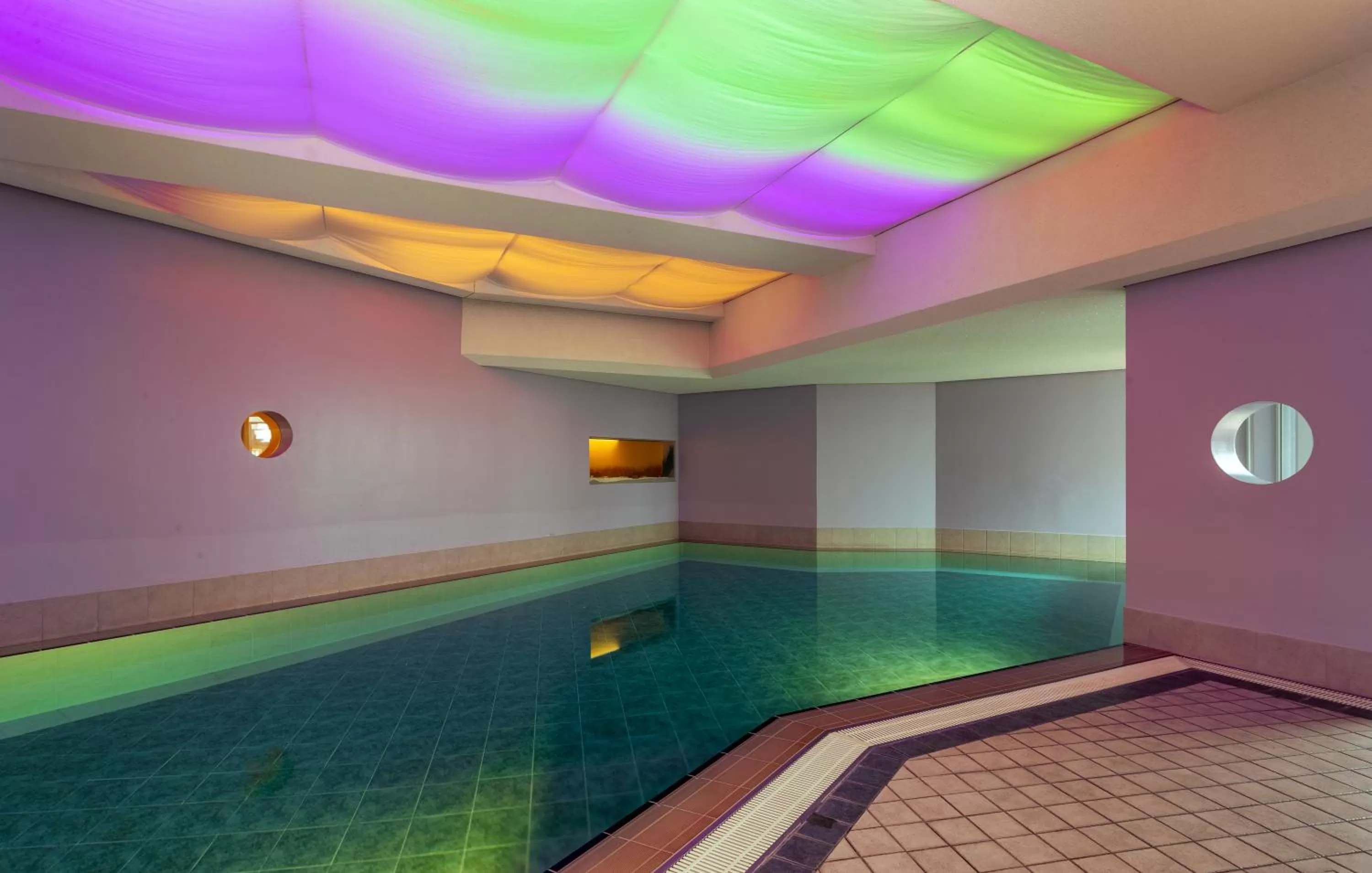 Swimming pool in ambassador hotel & spa