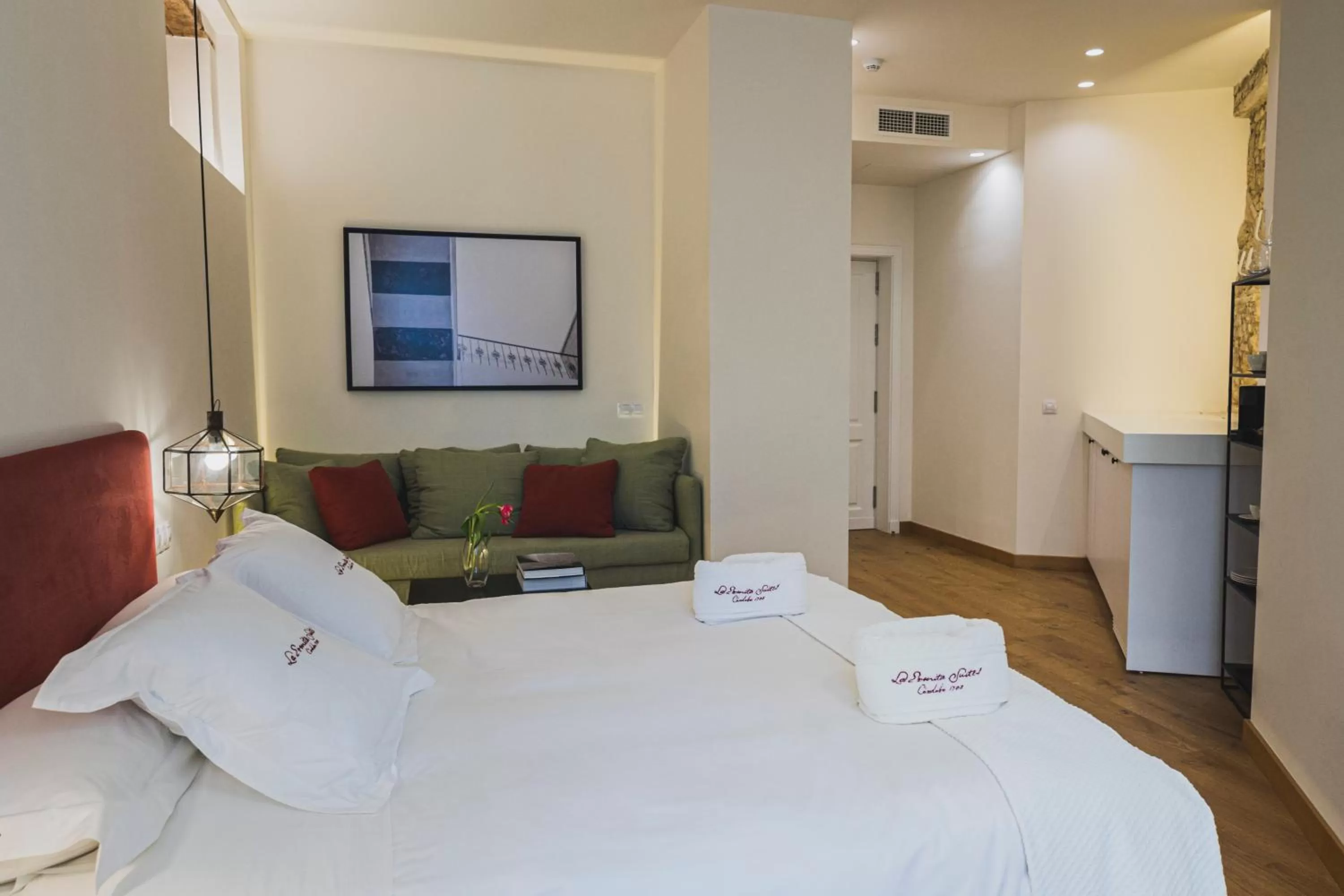 Bedroom, Bed in La Ermita Suites - Único Hotel Monumento de Córdoba