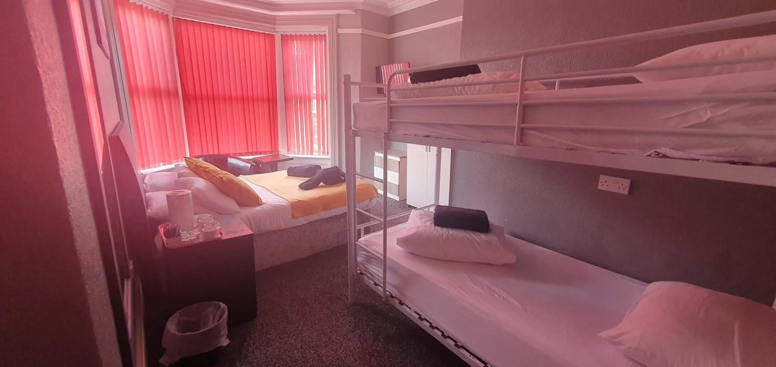 Bed in Palm Beach Hotel by the Sea