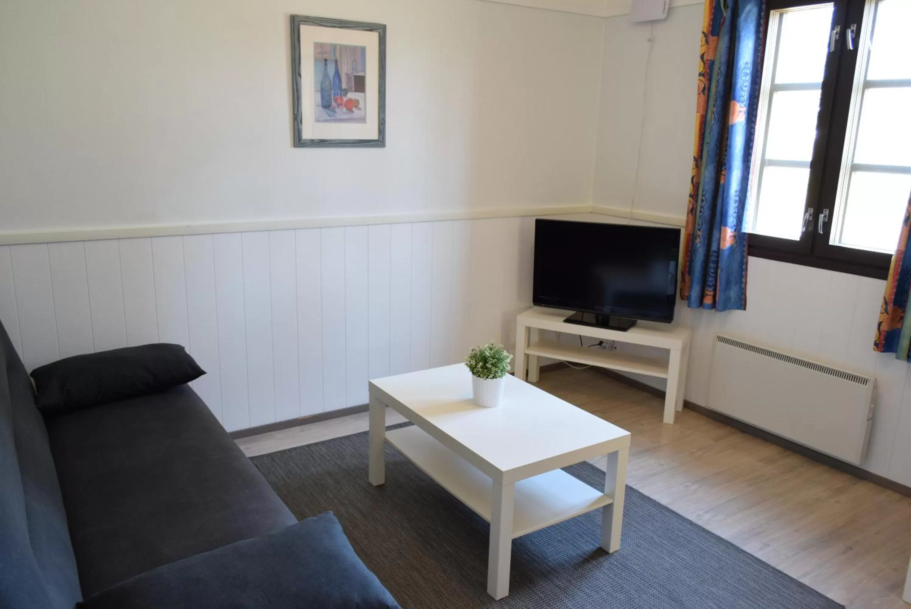 Living room, TV/Entertainment Center in Visulahti Cottages