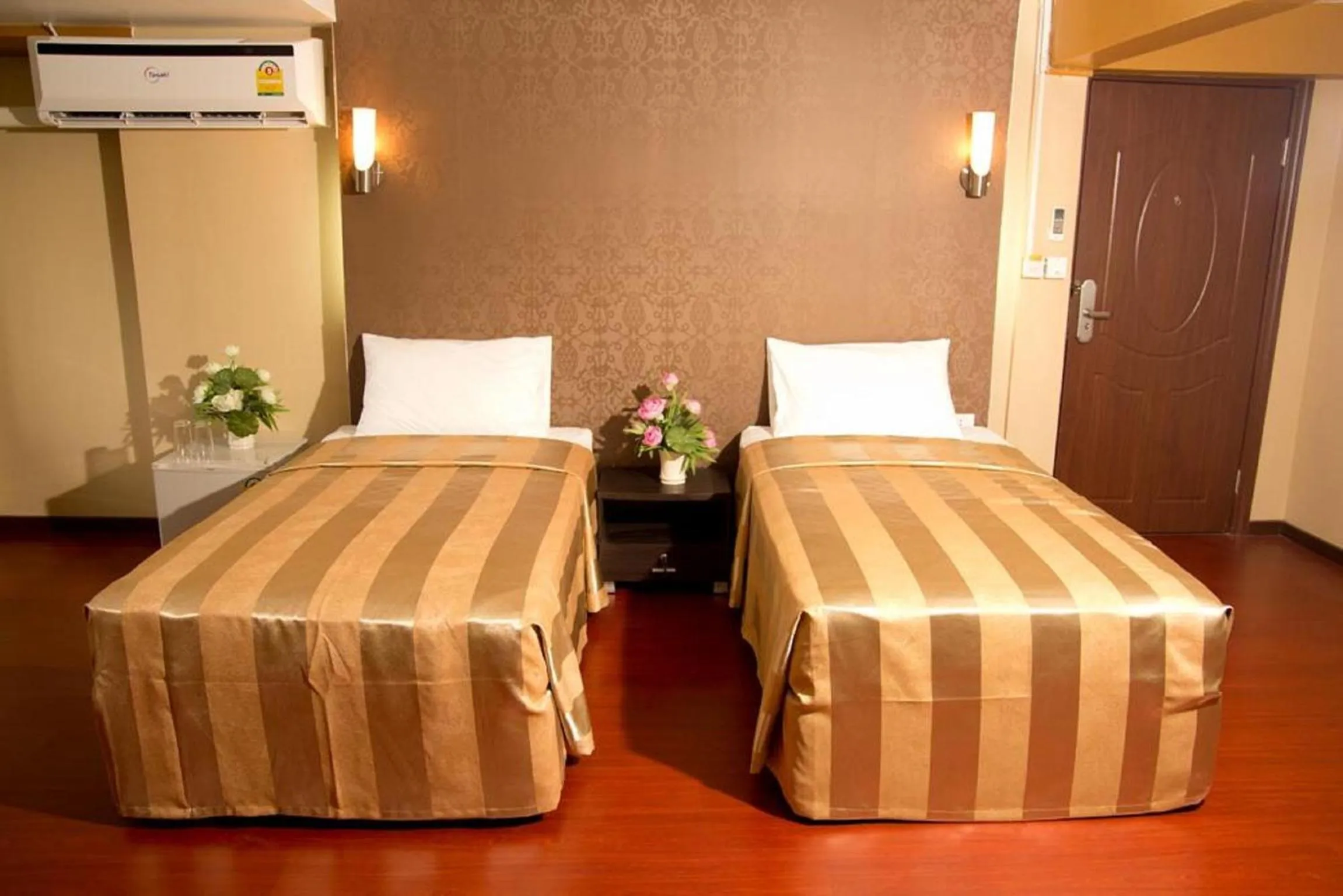 Bed in Visiting Card Hotel & Resort