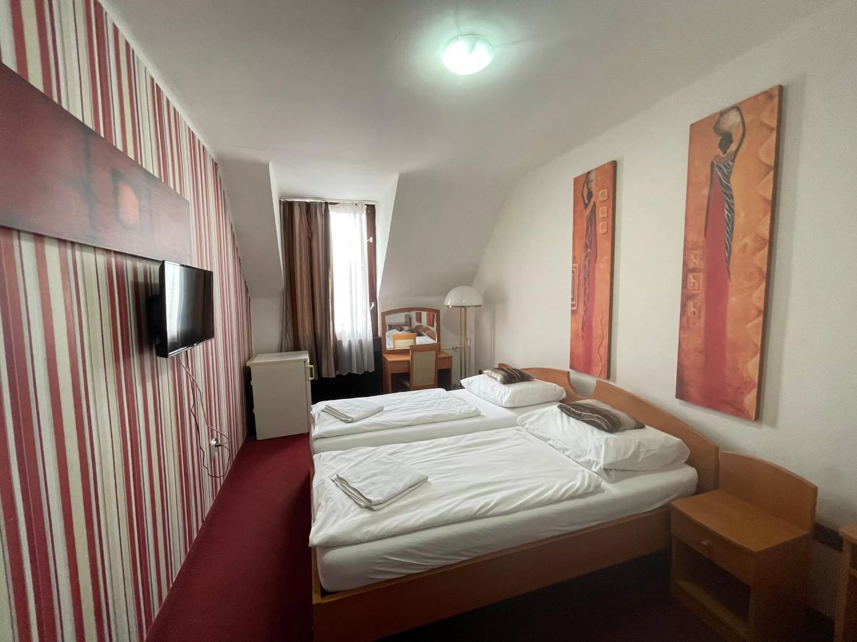 Bed in Hotel Minaret&Étterem