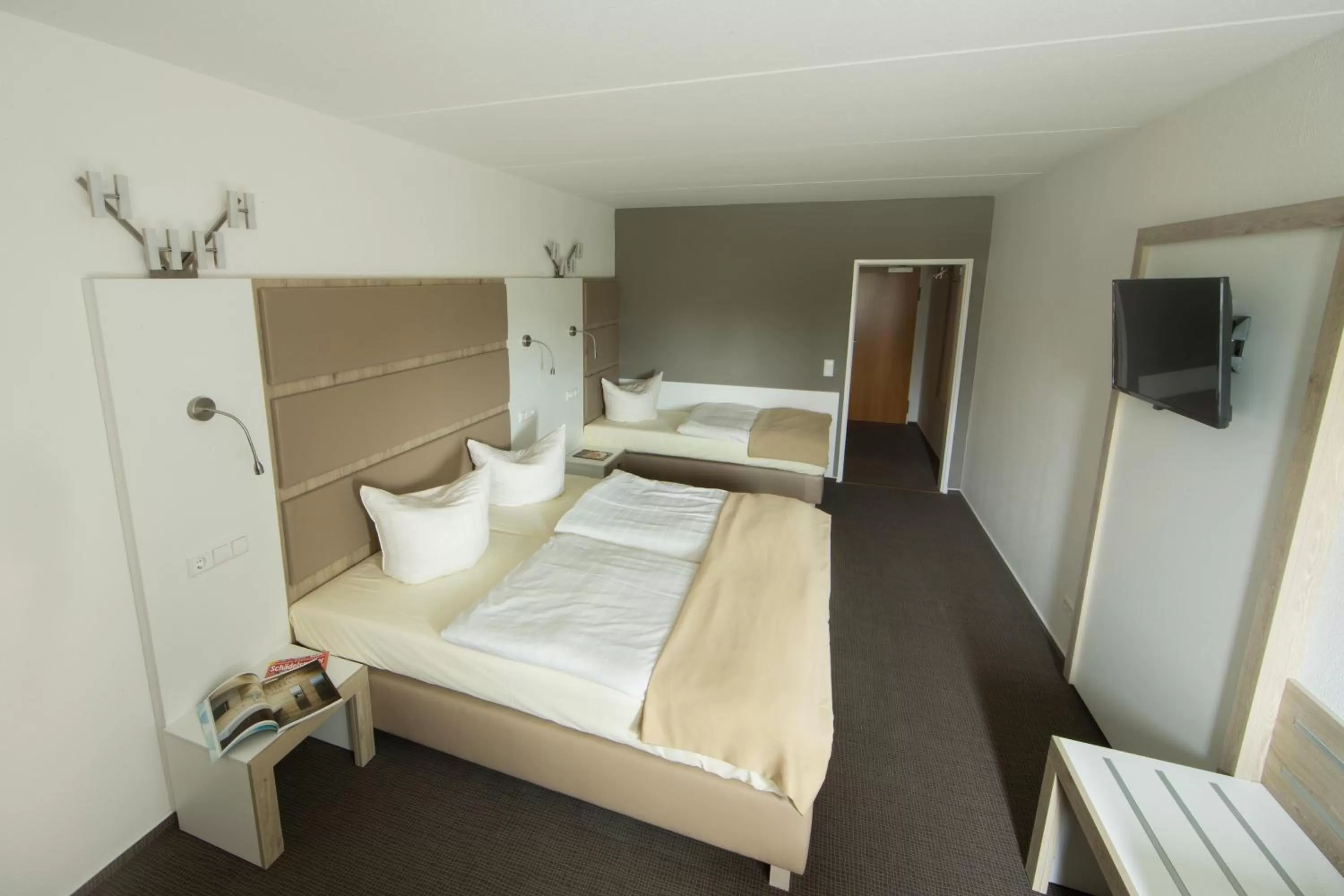 Bed in Confour Hotel