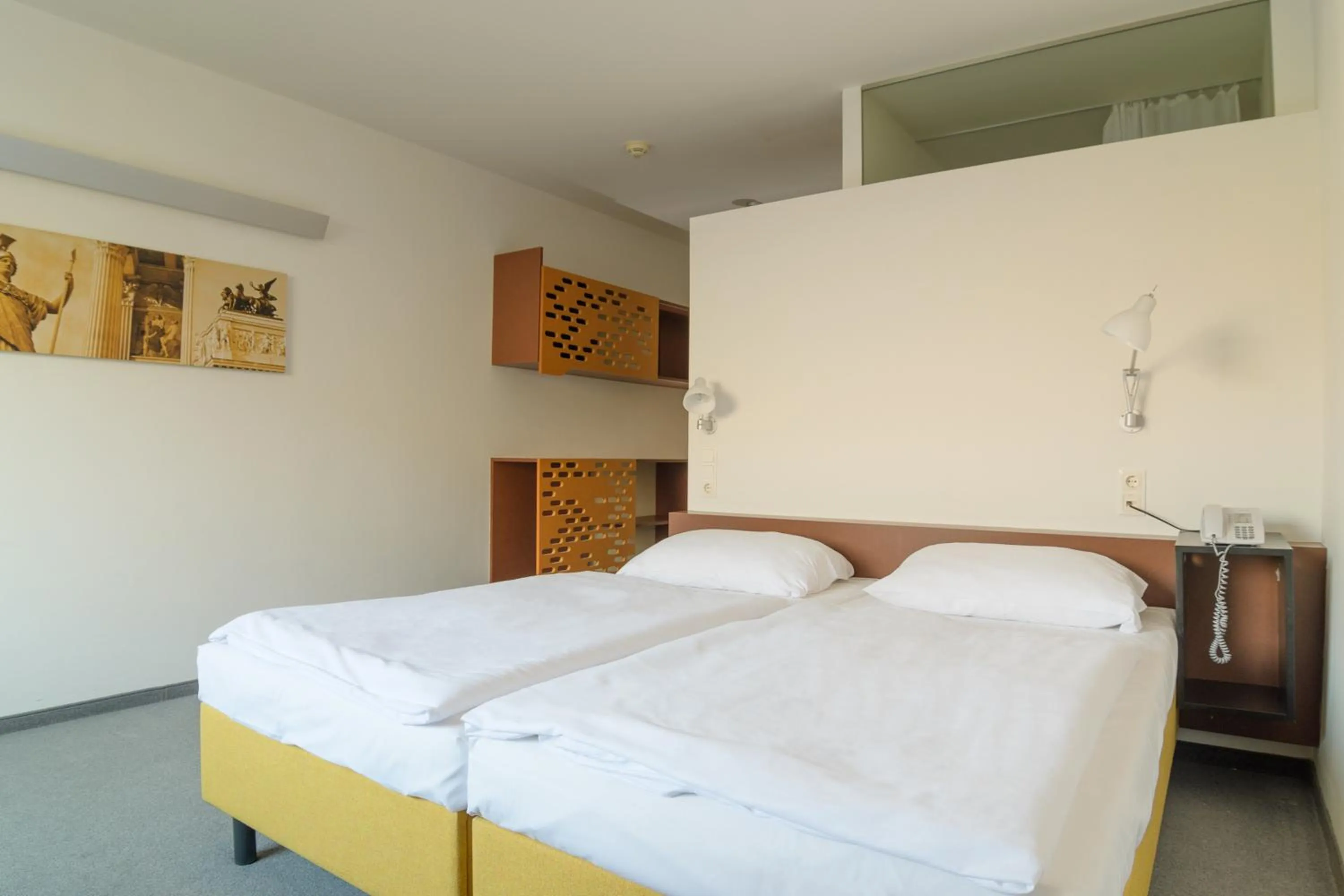 Bed in Kyriad Vienna Altmannsdorf