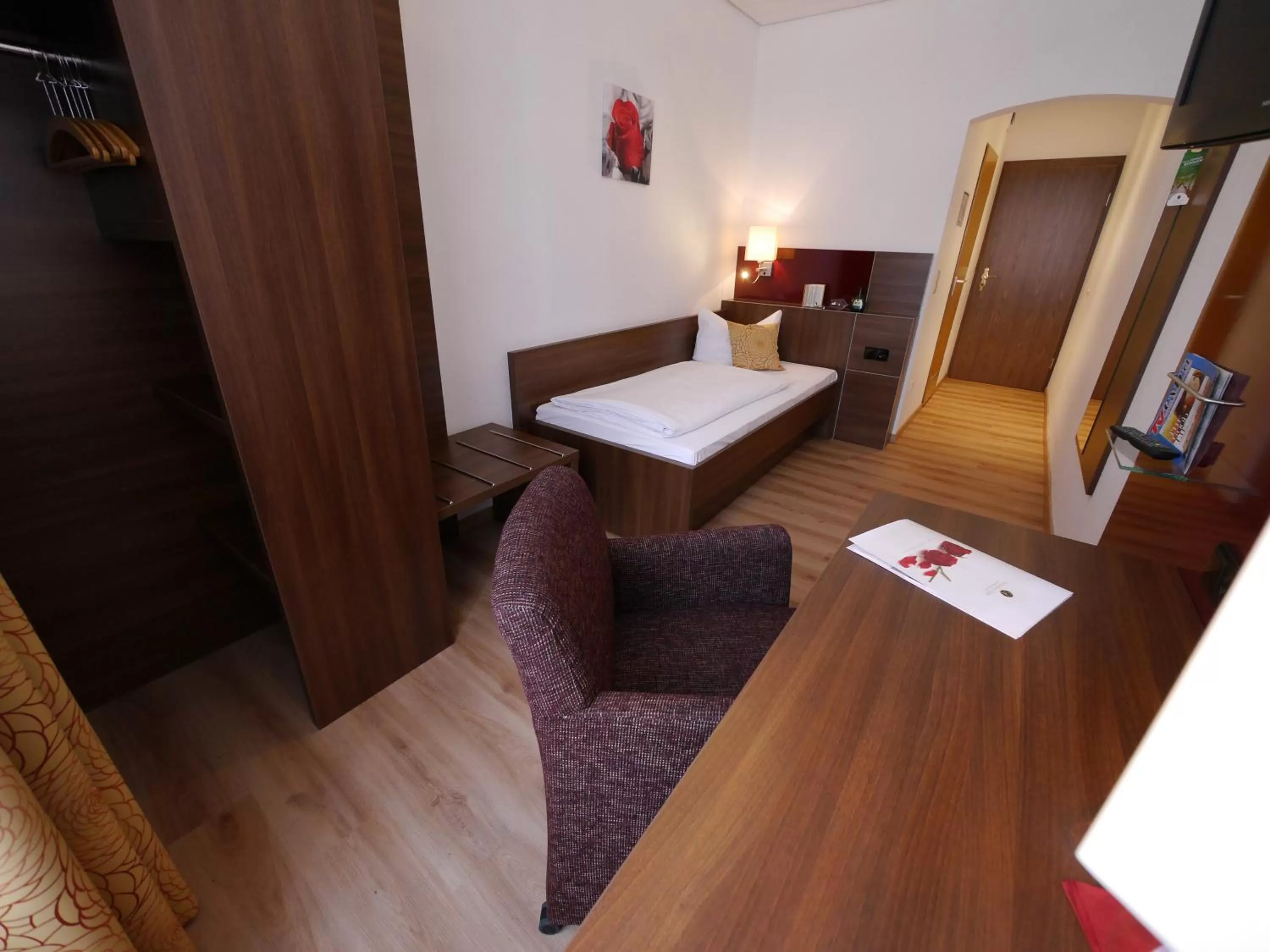 Photo of the whole room, Bed in Romantica Hotel Blauer Hecht