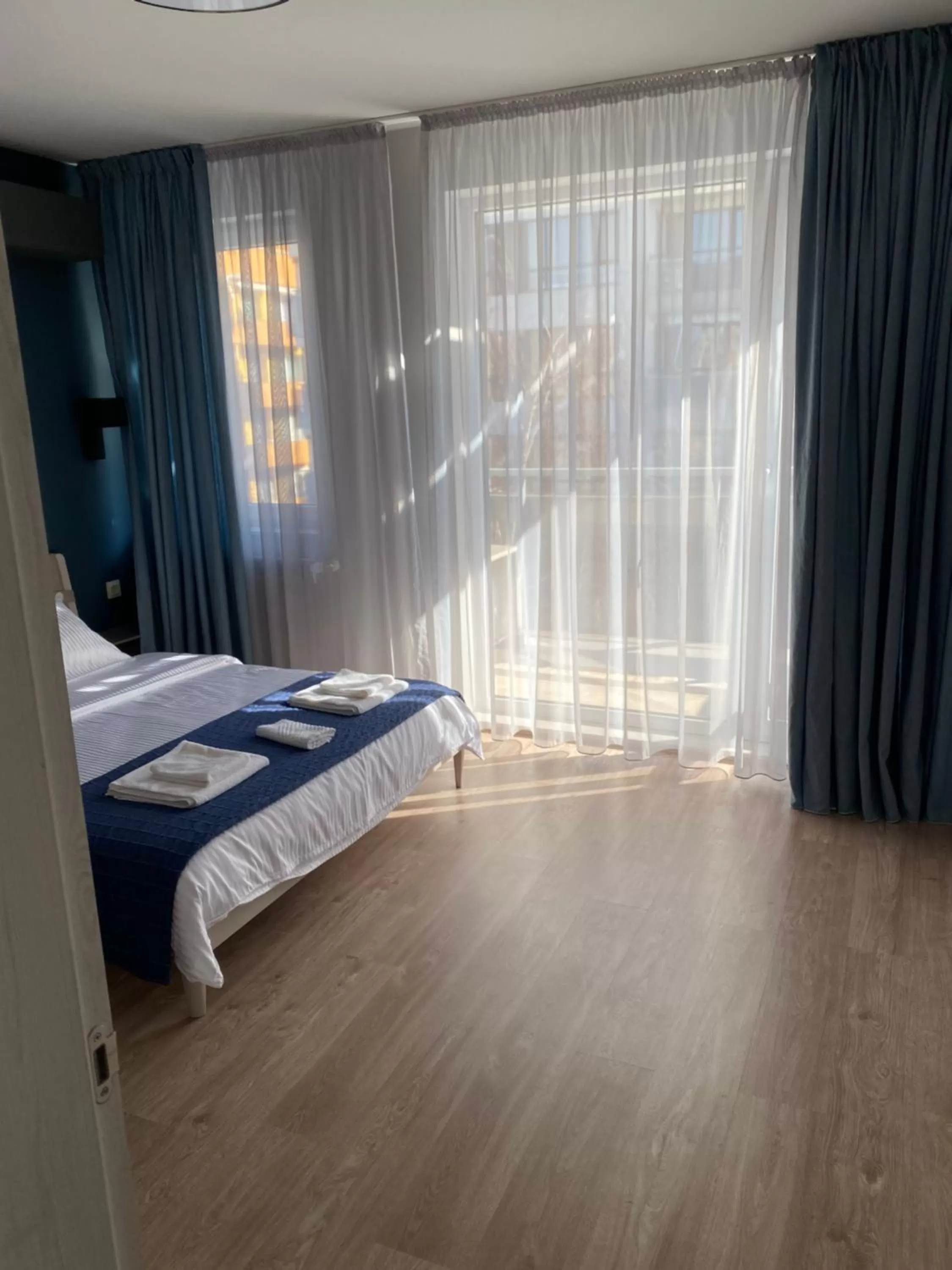 Bed in 7th Sense boutique apartments