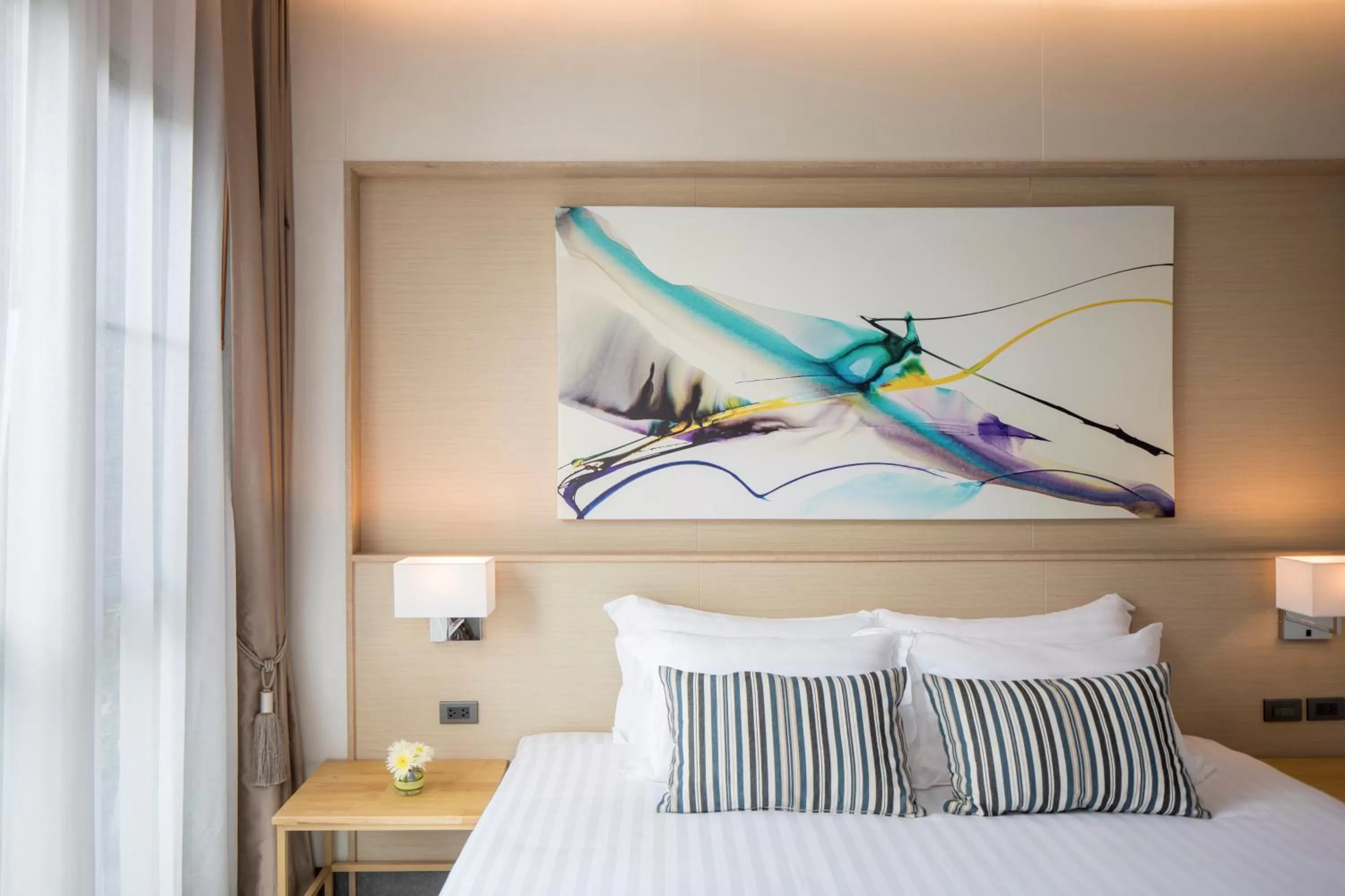 Bed in AisanA Hotel Korat