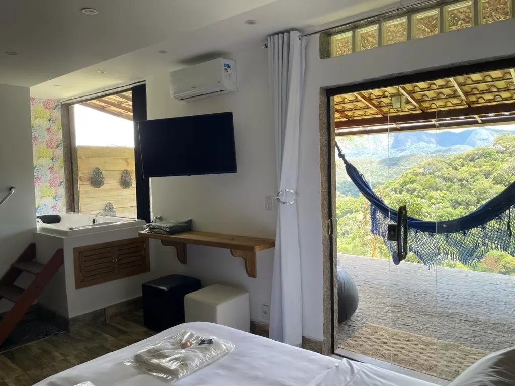 Bed in Pousada R.N.C. Nosso Paraíso