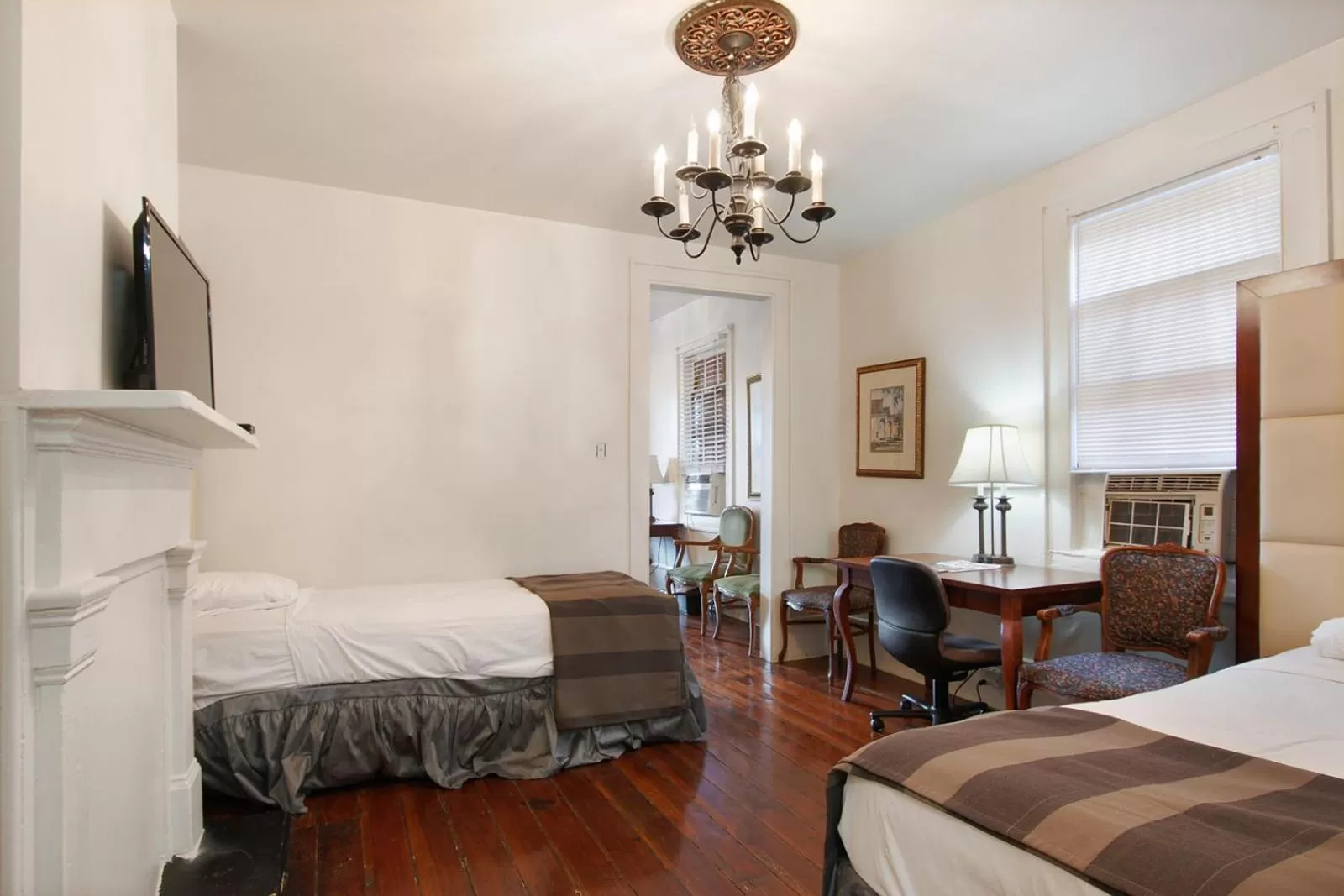 Bed in Historic Mardi Gras Inn