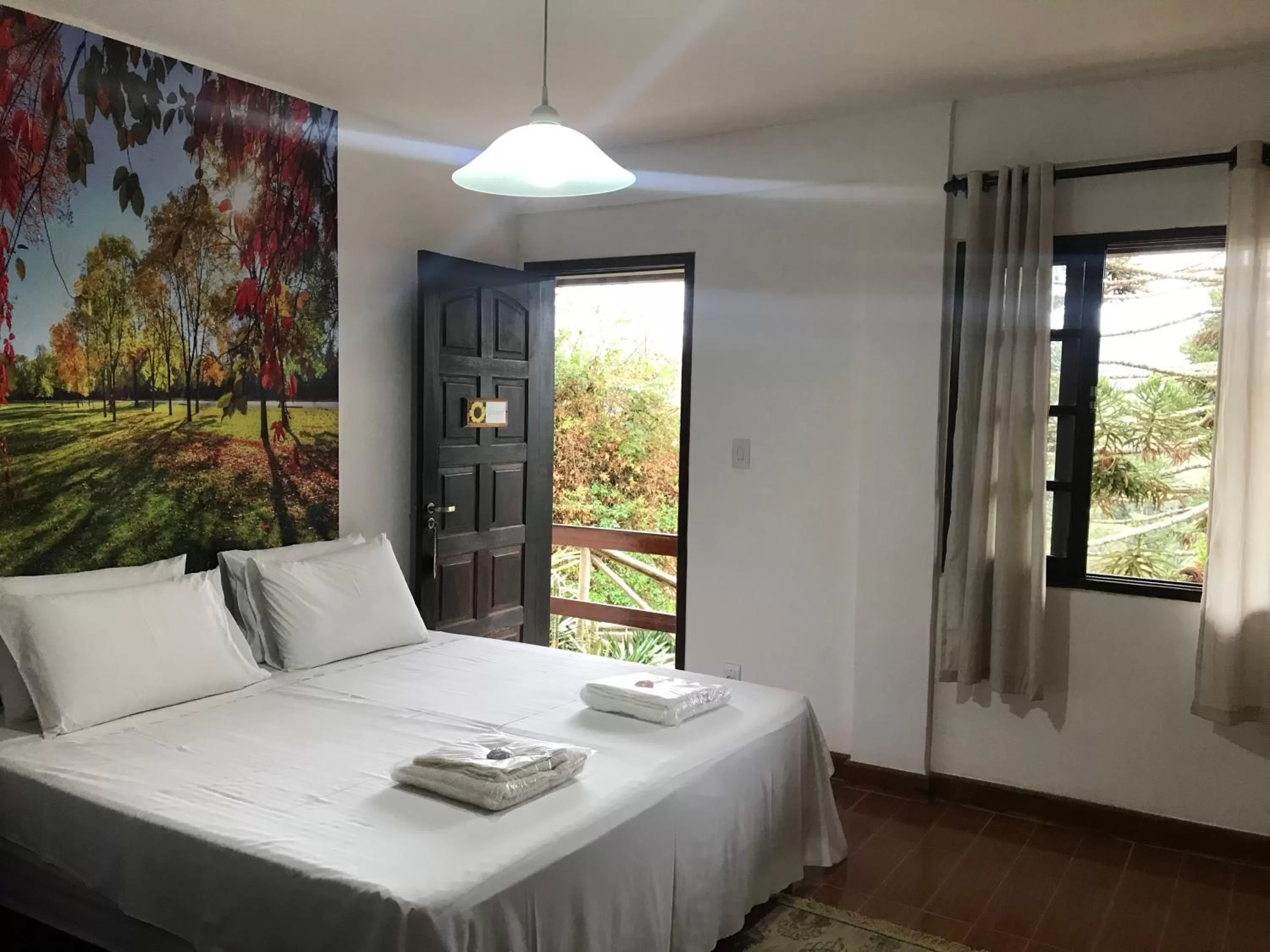 Bed in Pousada R.N.C. Nosso Paraíso