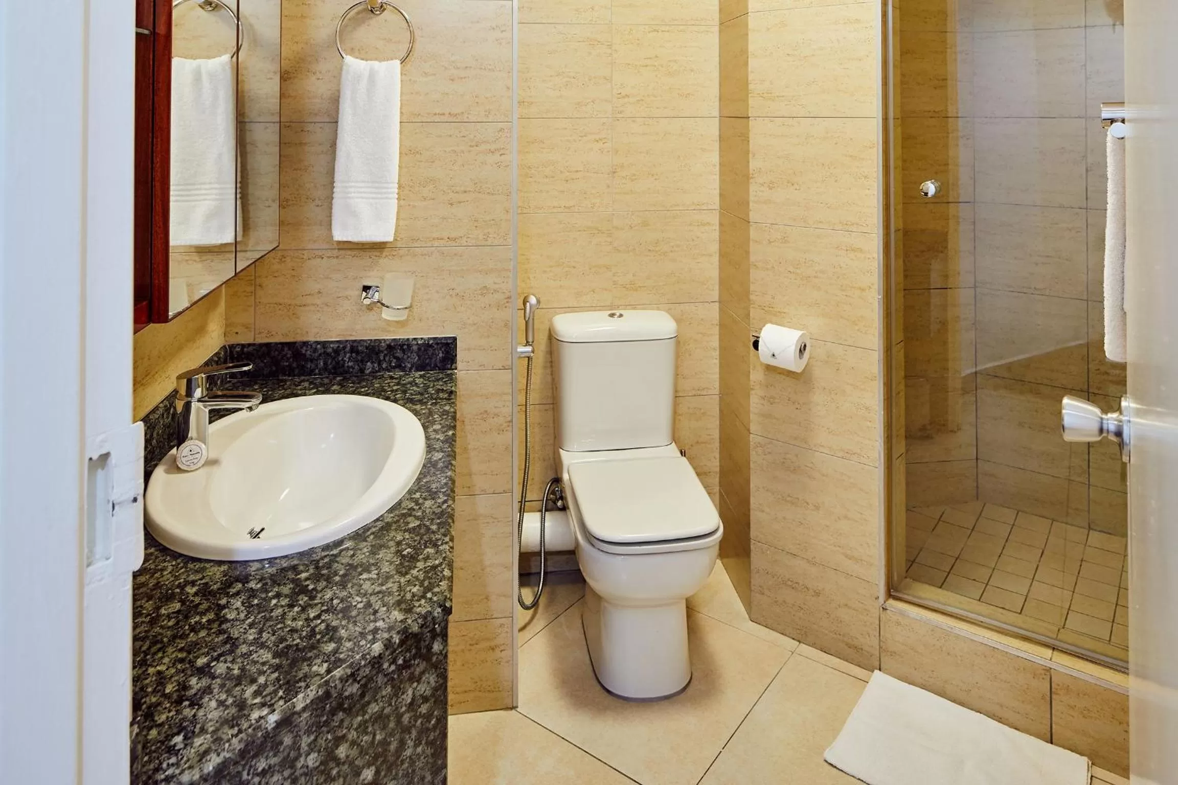 Shower in First Group The Palace All-Suite