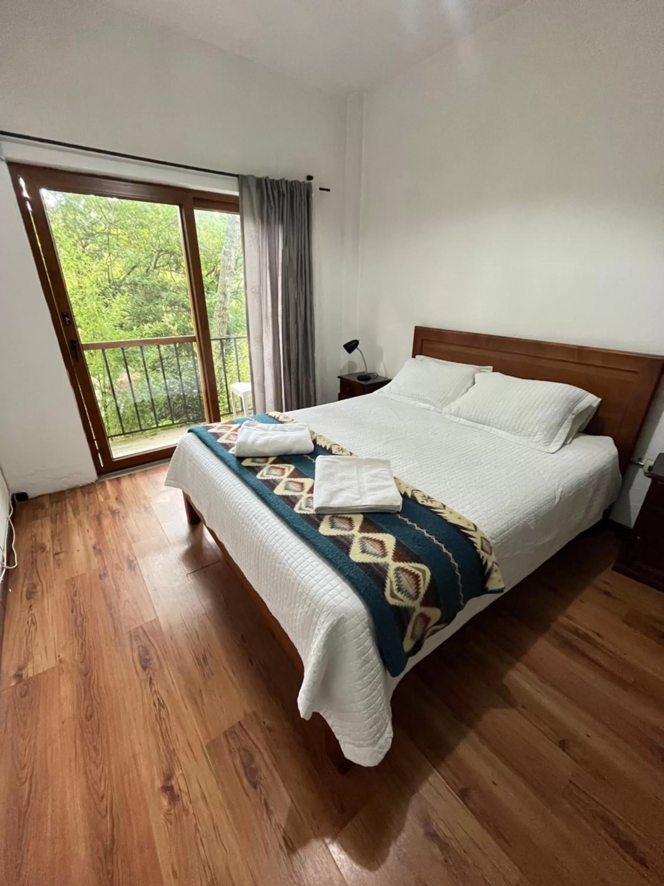 Bed in Apartamentos Otorongo Cuenca Ecuador