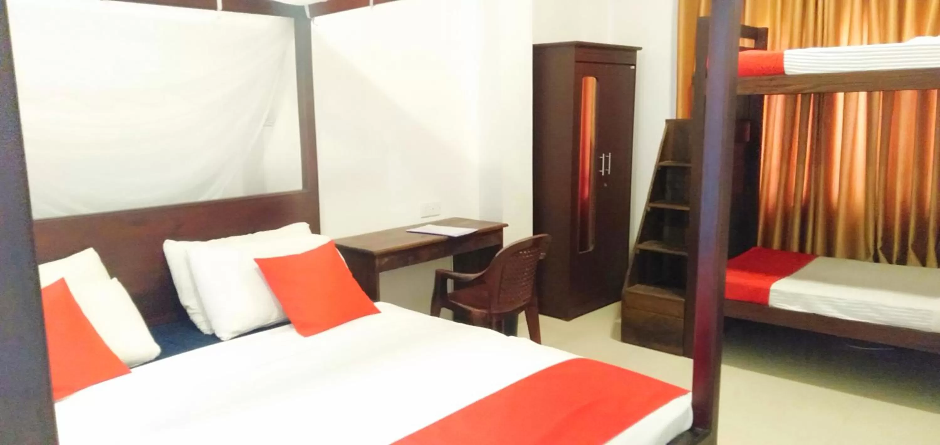 Bed in Ocean Bay Surf Resort Weligama