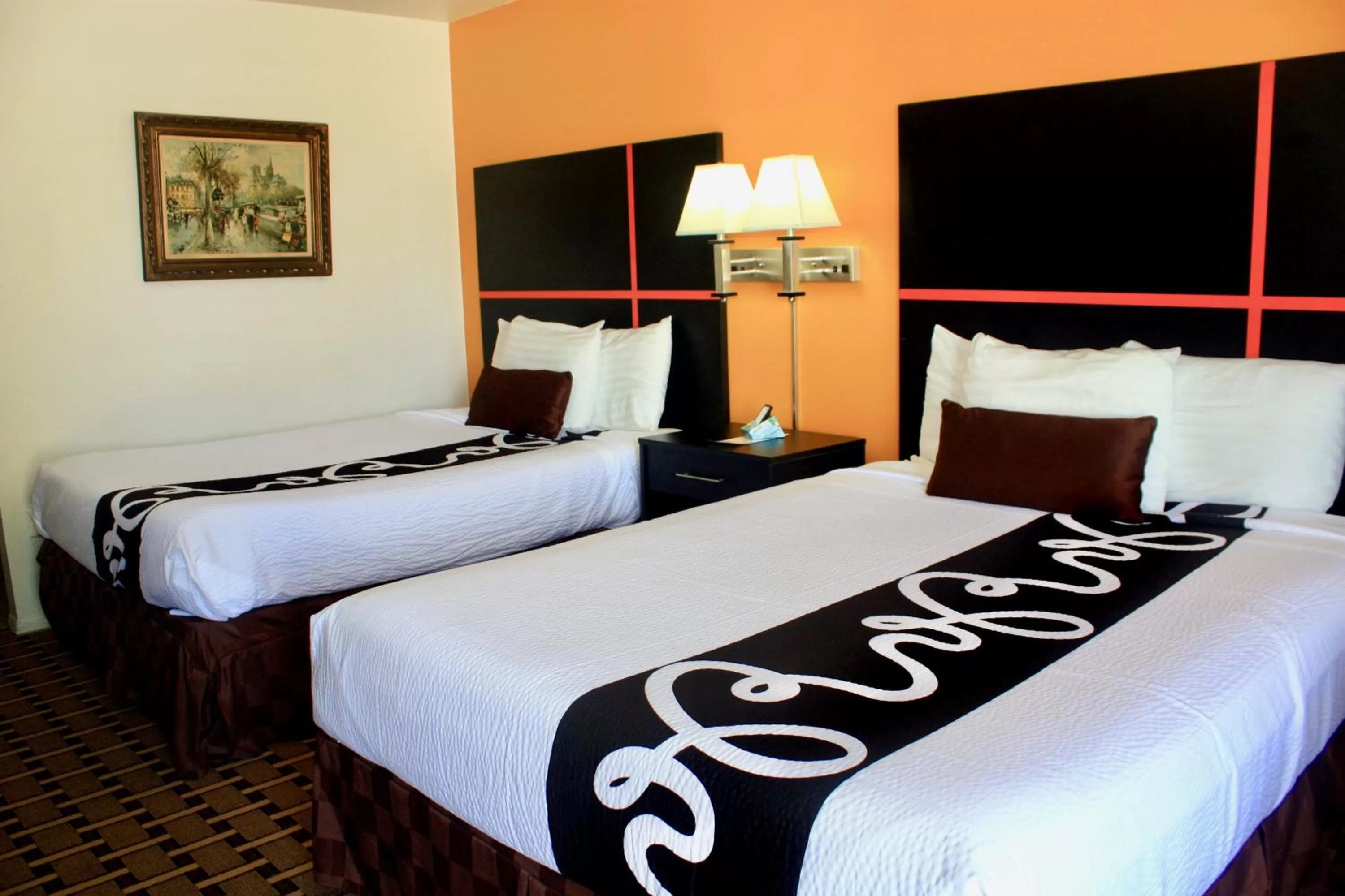 Bed in Chaparral Motor Inn