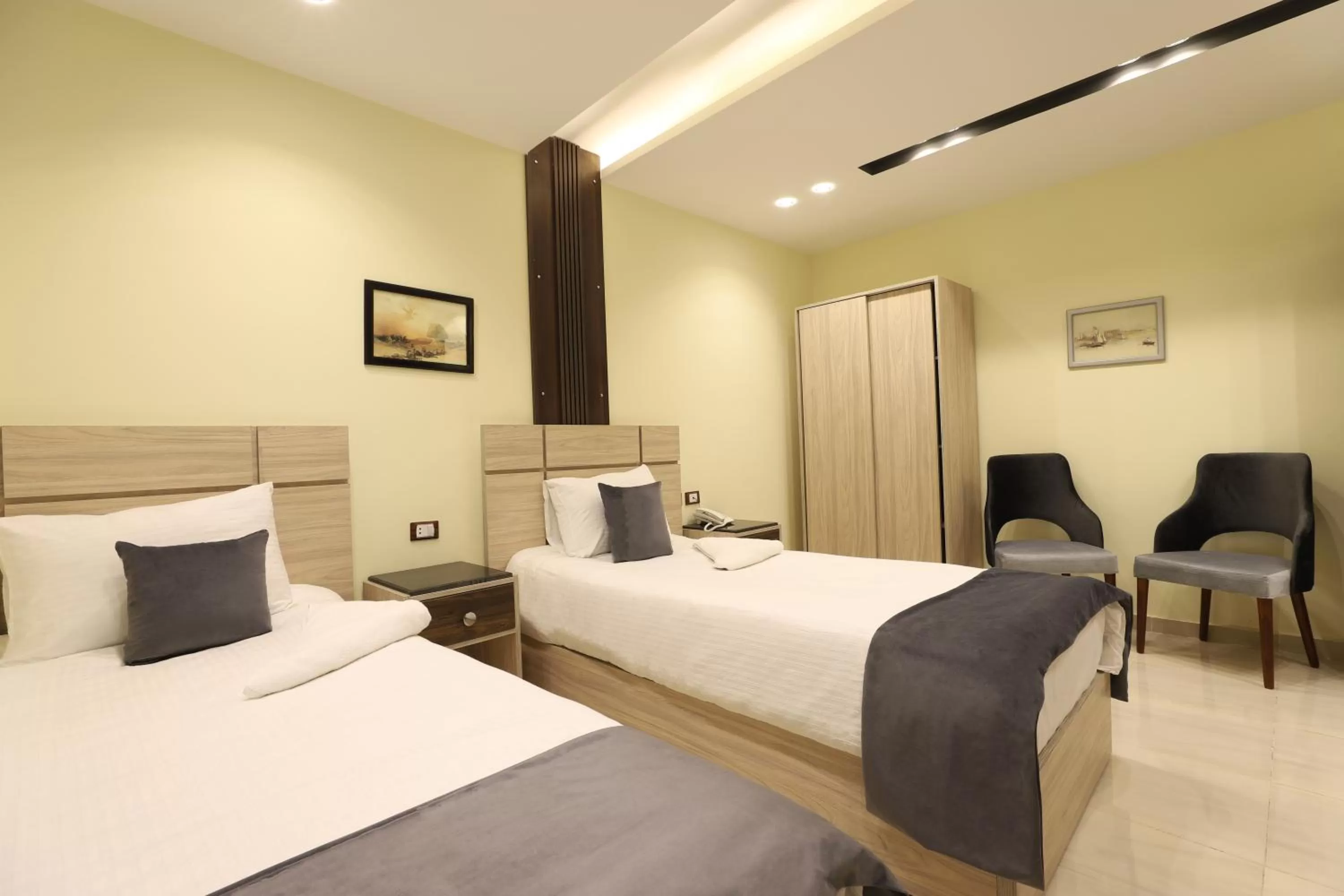 Bed in Brothers Pyramids View Hotel