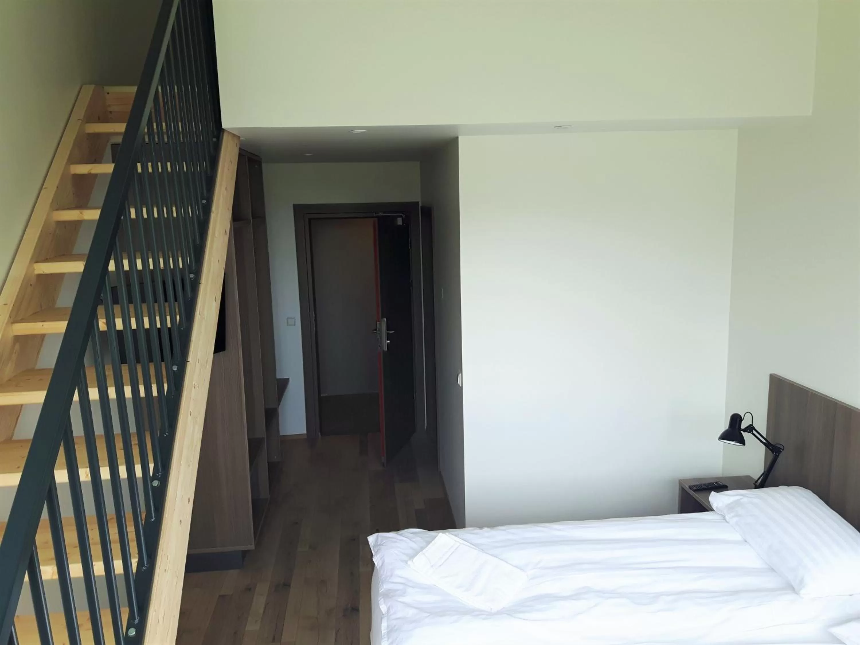 Photo of the whole room, Bed in Milk Factory