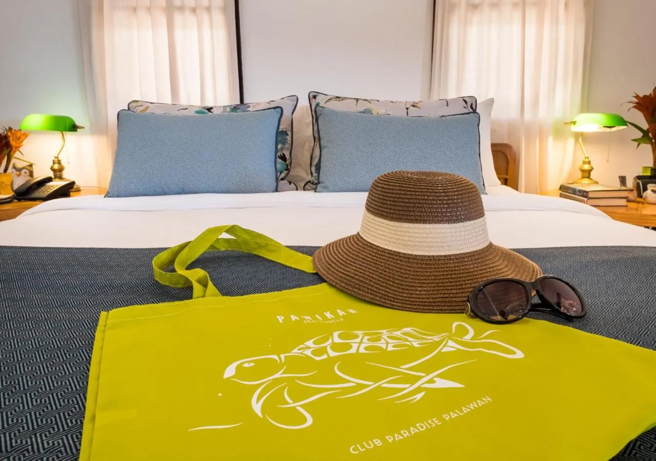 Bed in Discovery Coron formerly Club Paradise Palawan