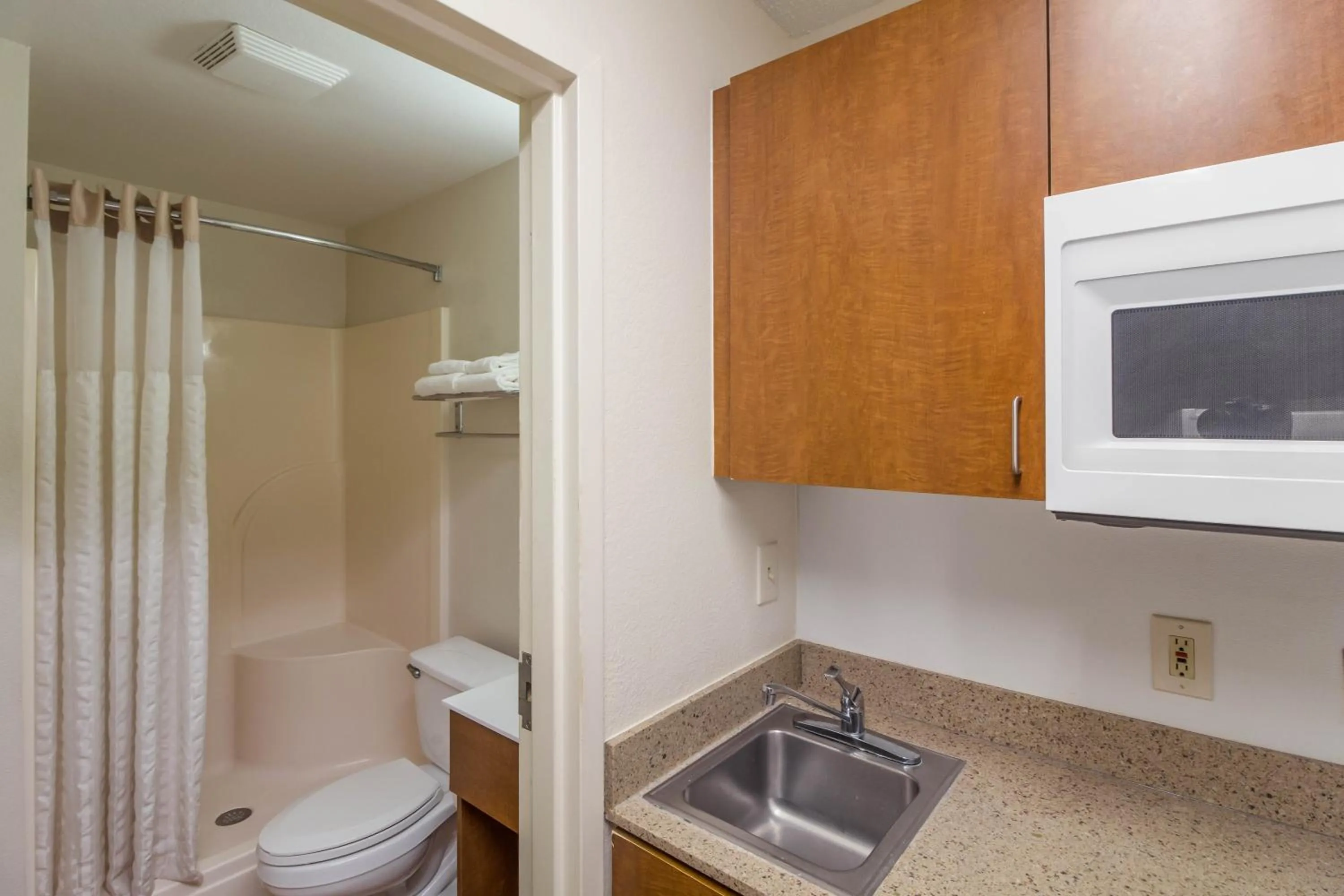 Bathroom in HomeTowne Studios by Red Roof Houston - Northwest