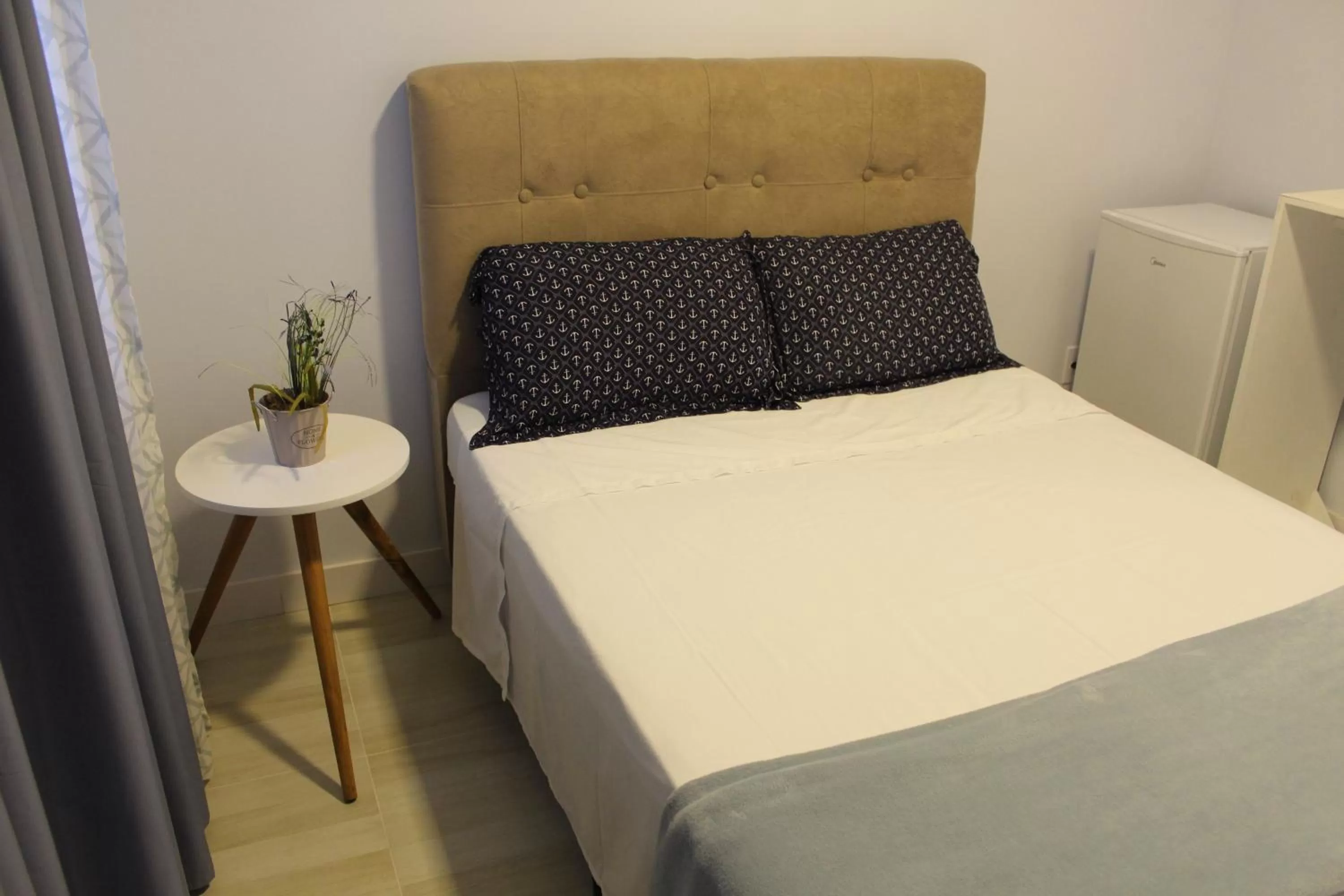 Bedroom, Bed in Hotel e Pousada Magic