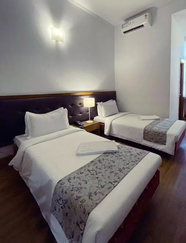 Bed in Hotel Tragopan