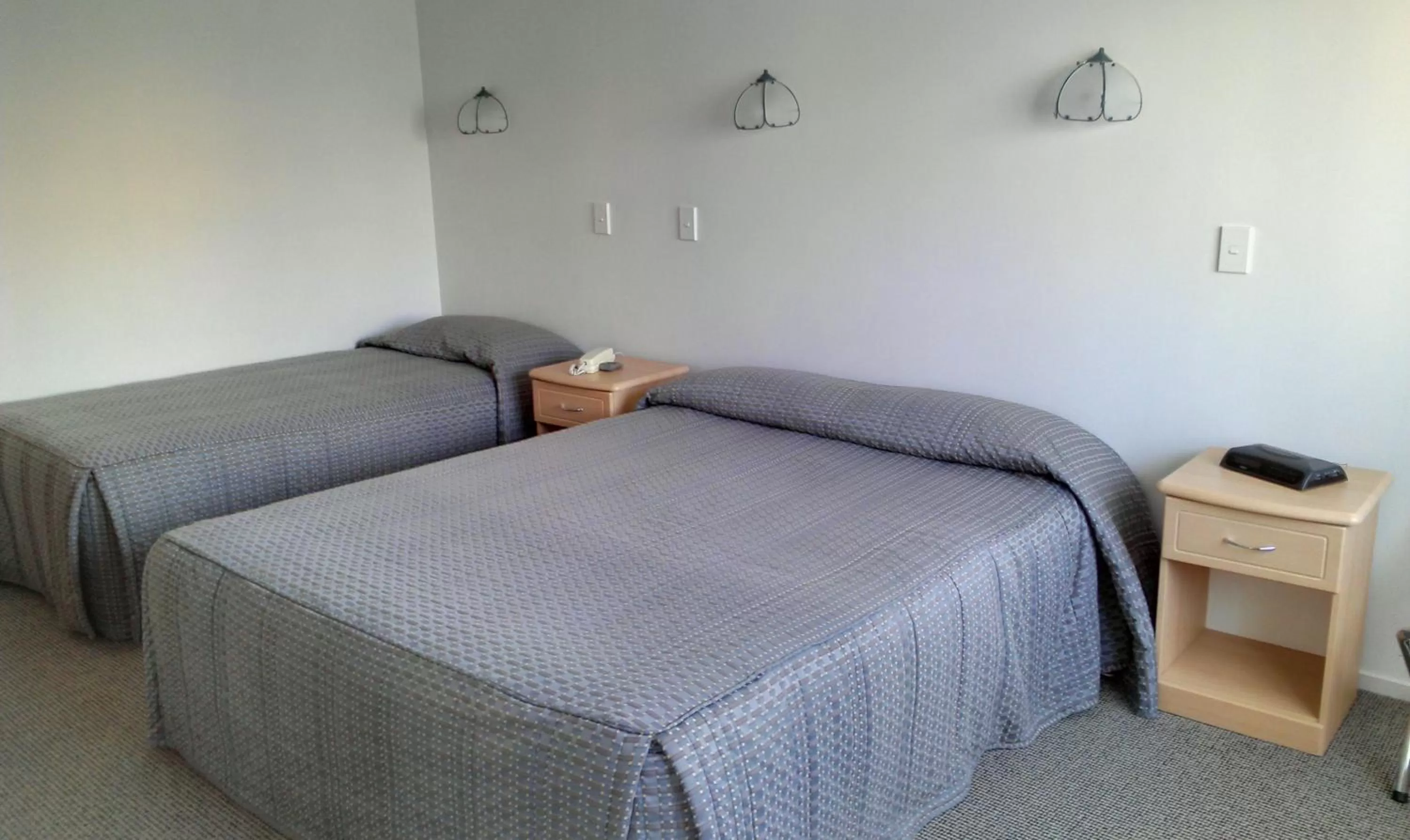 Bed in Riverview Motel